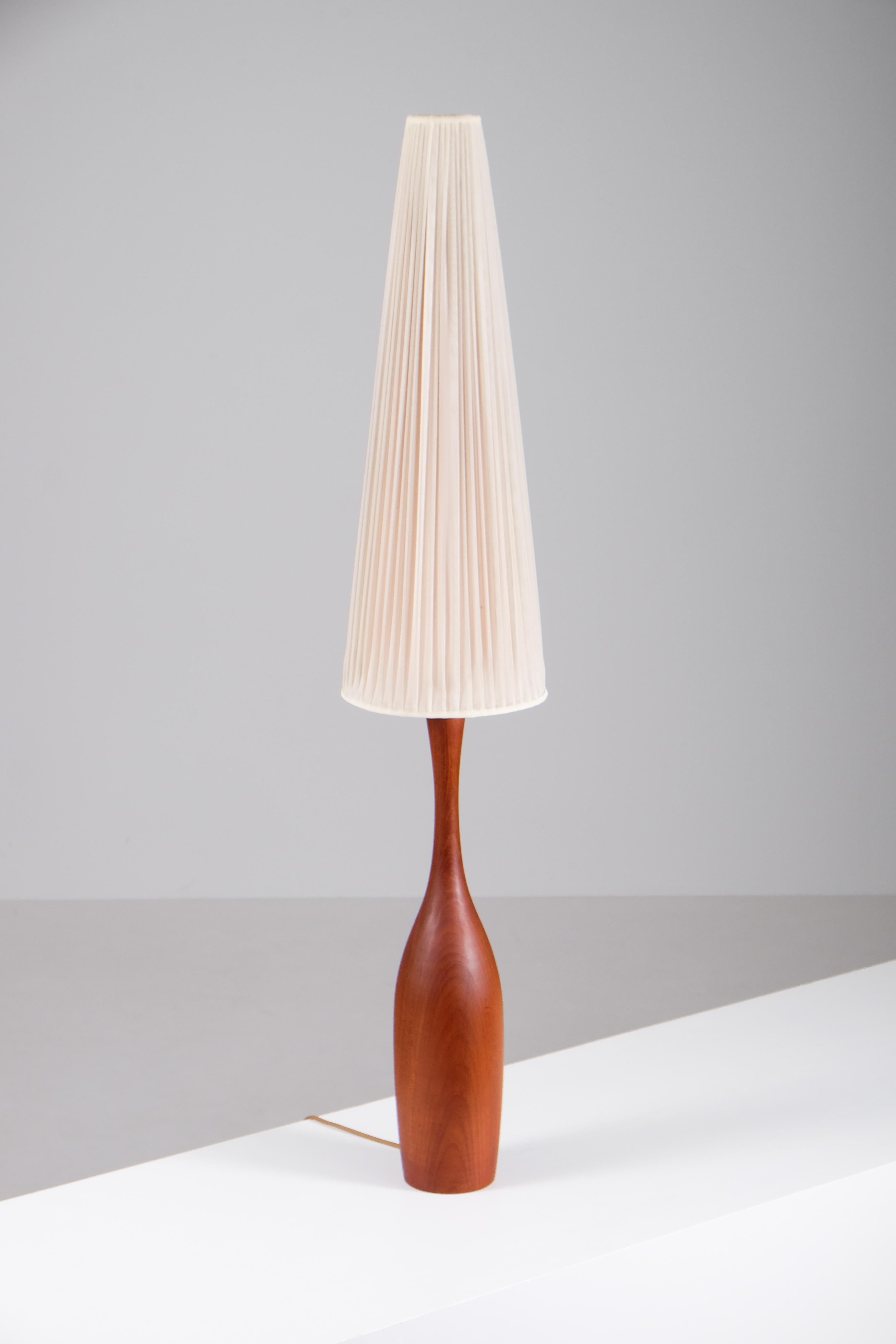 Rare teak floor lamp / table lamp produced in Denmark during the 1960s.