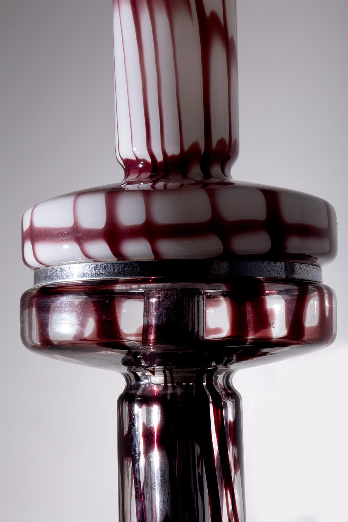 Discover the timeless magic of the table lamp produced by Esperia, an iconic creation by Angelo Brotto from the 1960s-70s. This lamp, reminiscent of the Space Age period, can be used as both a floor and table lamp, offering unique versatility that