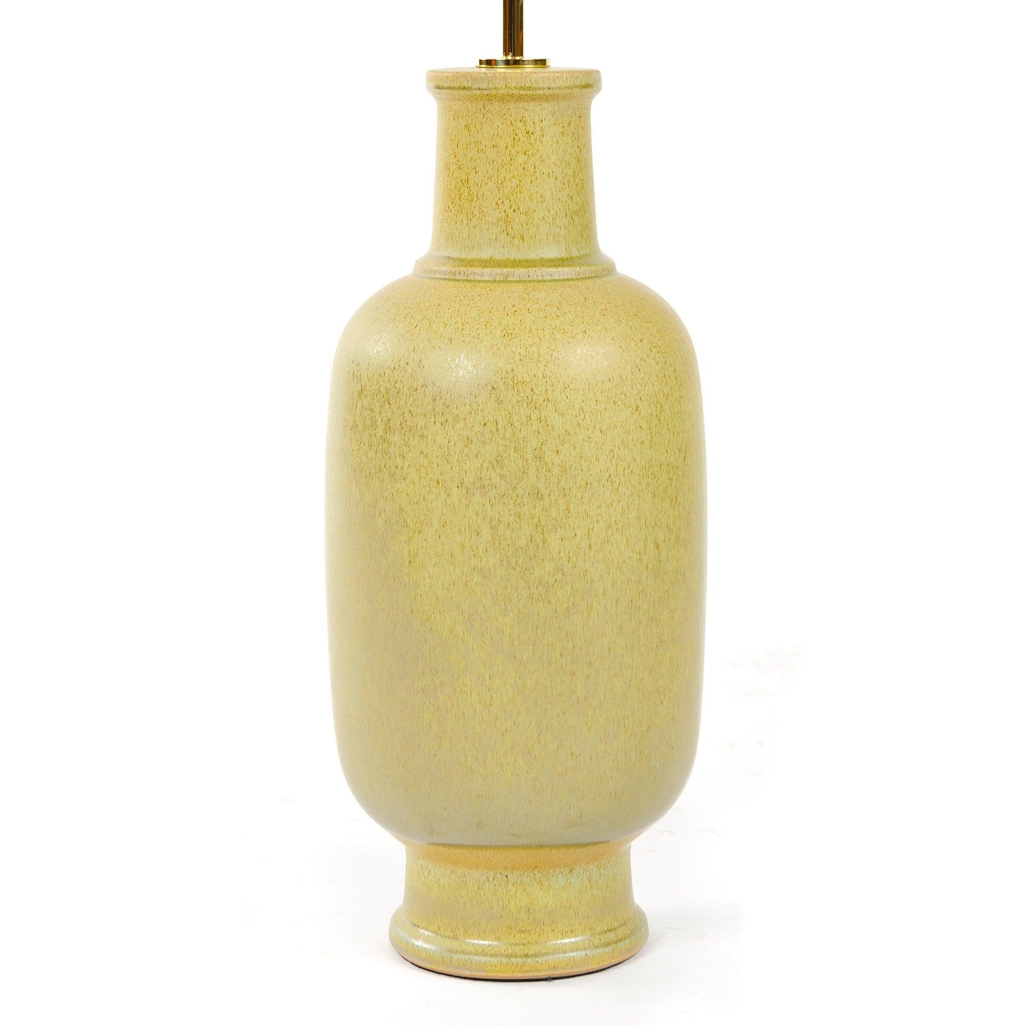 Based on Rosen's earlier ceramic forms, the hand thrown â€˜4300 Series' of 1967 expanded the types of hand applied glazes with an enlarged palette of colors and glaze techniques. This particular unit, Model 4394, was ordered in a â€˜TECHNIC AT