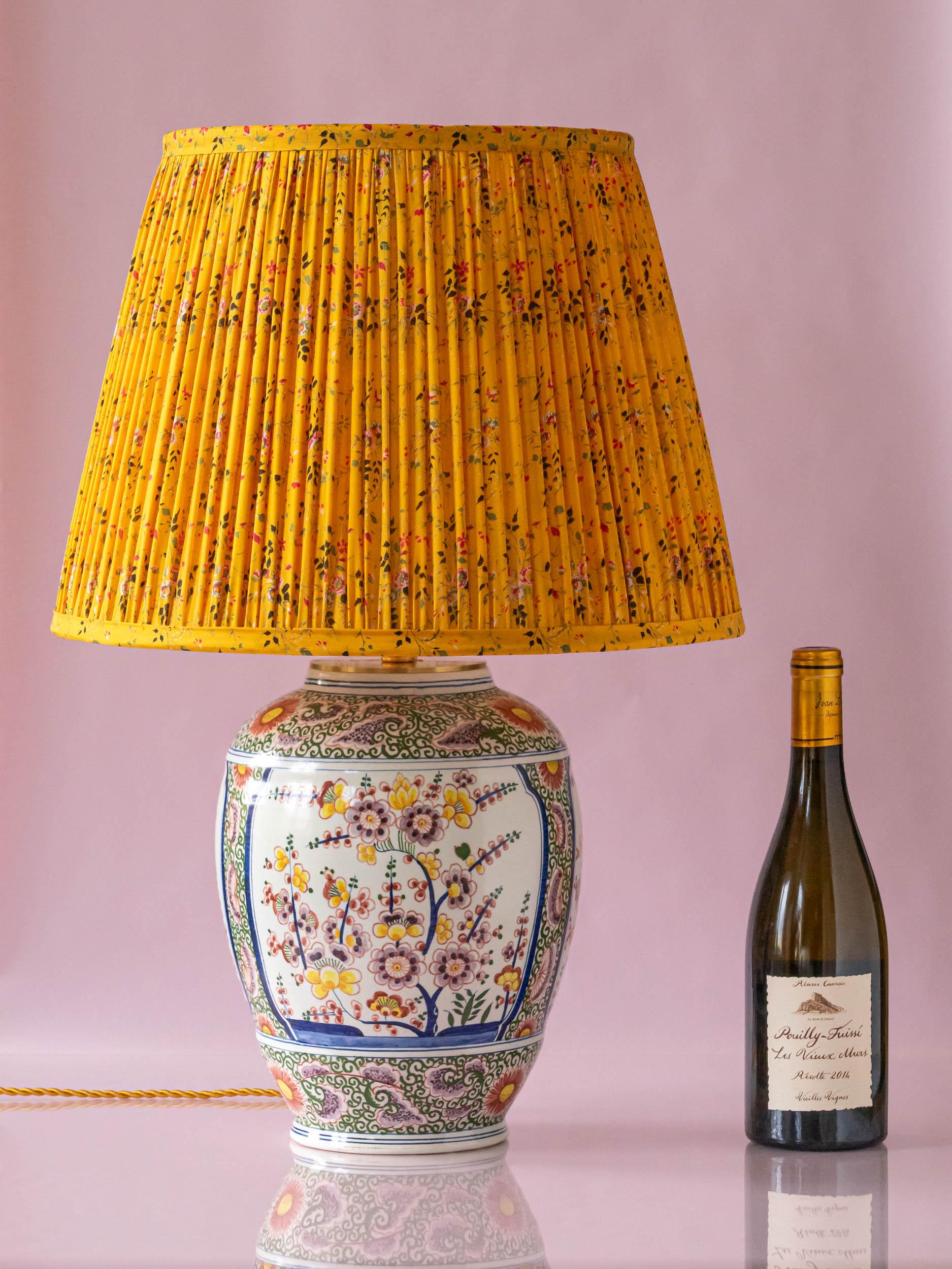 Lovingly handcrafted by Amitābha Studio in Amsterdam from an antique Boch Frères Keramis vase (circa 1872-1900) from the “la Chambre des peintres hollandais” (The Dutch Painter’s Chamber), Sakura is a one-of-a-kind table lamp. We've paired the vase