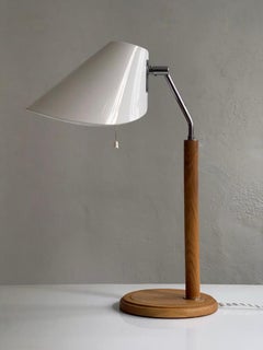 Table lamp from Bergboms in oak, leather, acrylic shade and chrome. Sweden 1970s