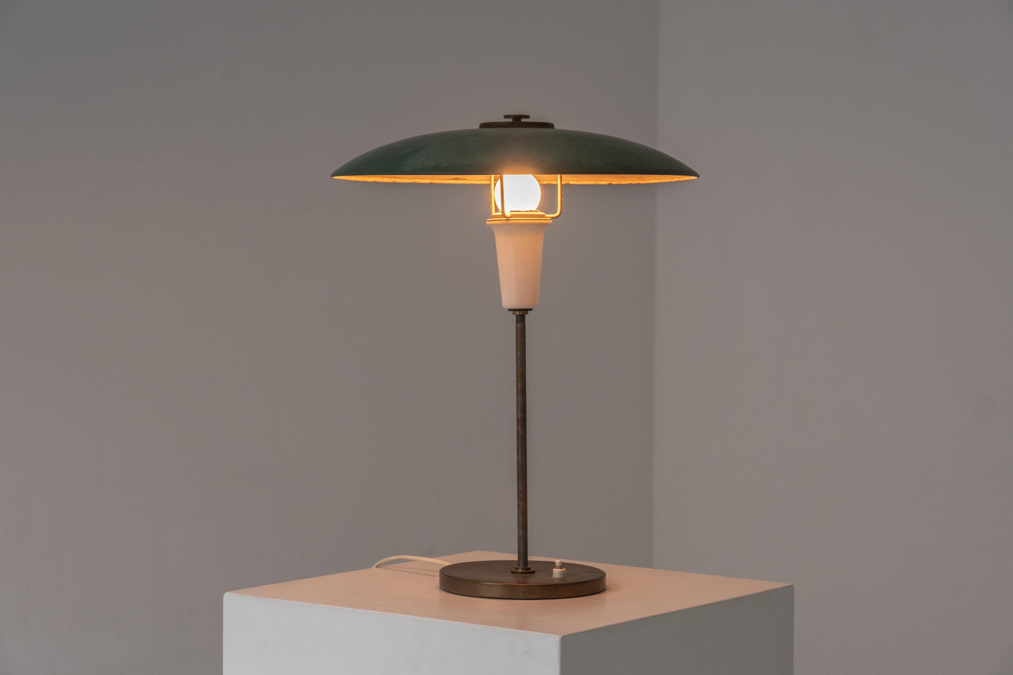 Scandinavian Modern Table lamp from Denmark, designed and manufactured during the 1960s.  For Sale