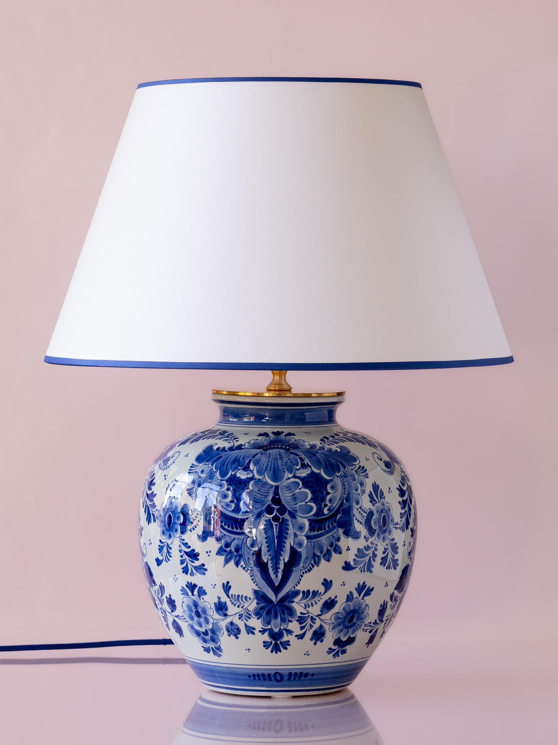 Introducing Mark, inspired by and named after the iconic American interior designer, Mark D. Sikes, renowned for his signature blue and white palettes. This one-of-a-kind table lamp is meticulously handcrafted from a vintage Royal Delft (De