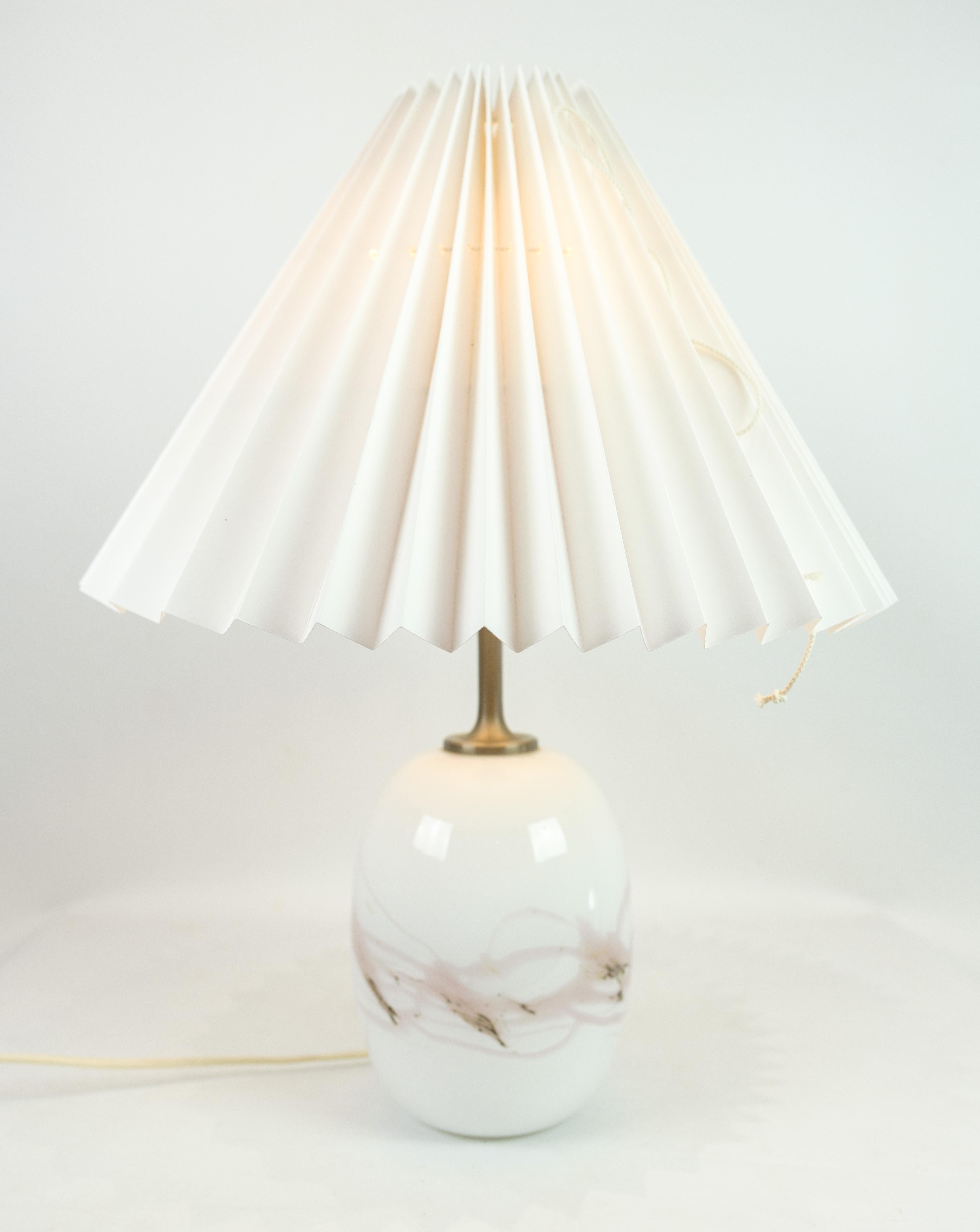 Table lamp, model Sakura, designed by Michael Bang with white opal glass with pink decoration.