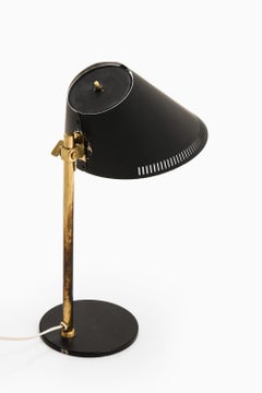 Table Lamp in Brass and Black Lacquered Metal by Paavo Tynell, 1950's