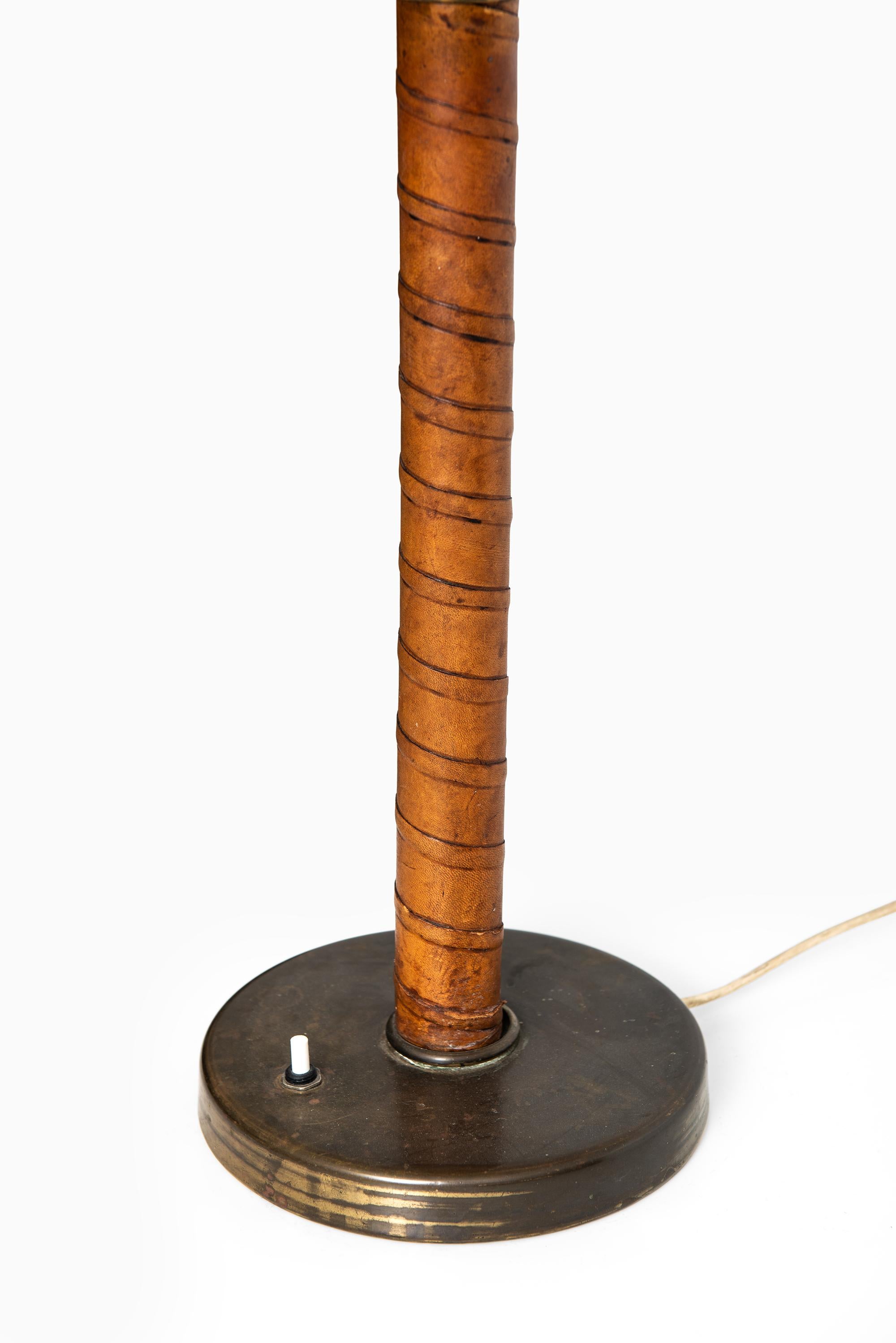 Mid-20th Century Table Lamp in Brass and Leather Produced by Nordiska Kompaniet in Sweden