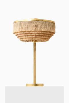 Lampe de table en laiton et franges de soie par Hans-Agne Jakobsson, années 1950