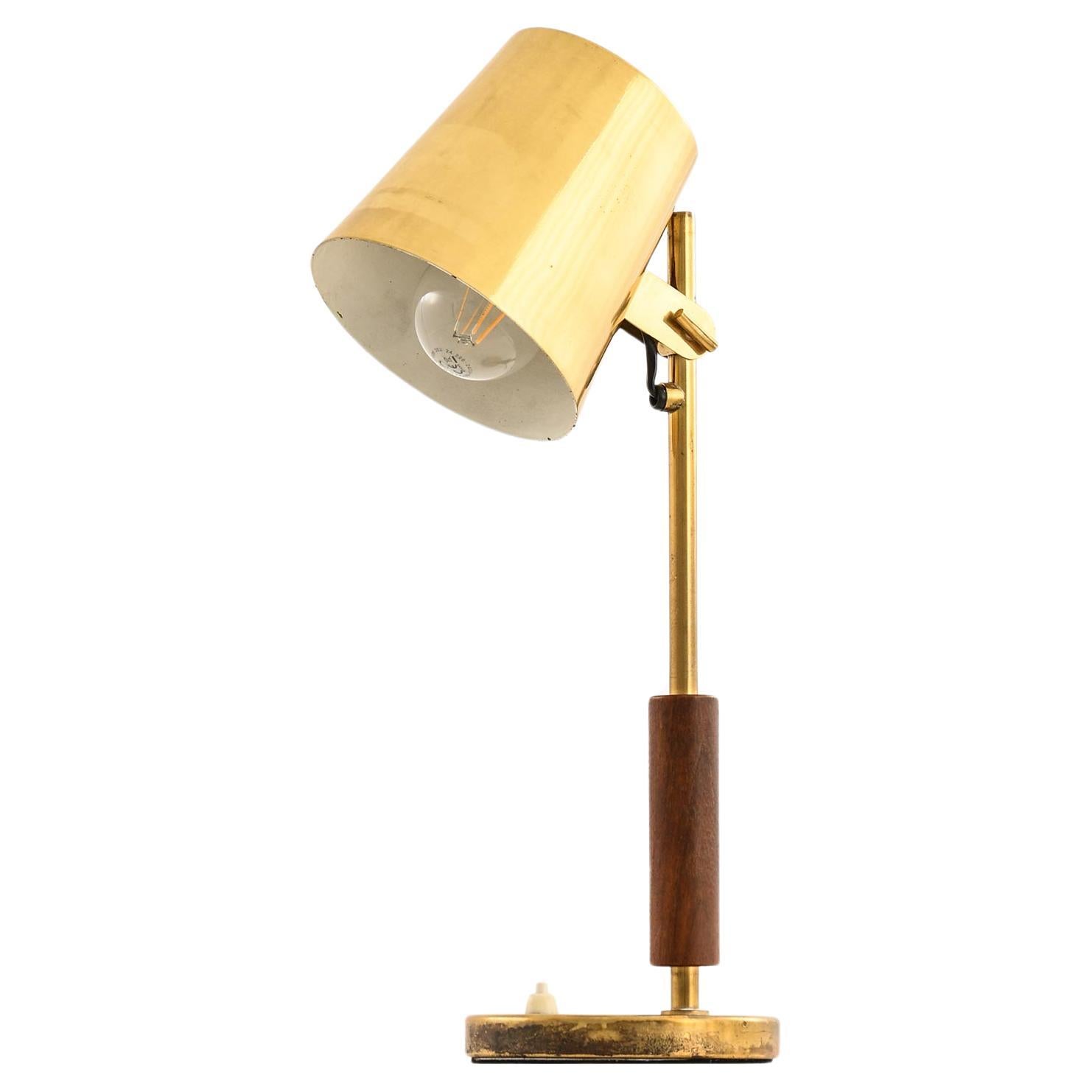 Table Lamp in Brass and Teak by Paavo Tynell, 1950s