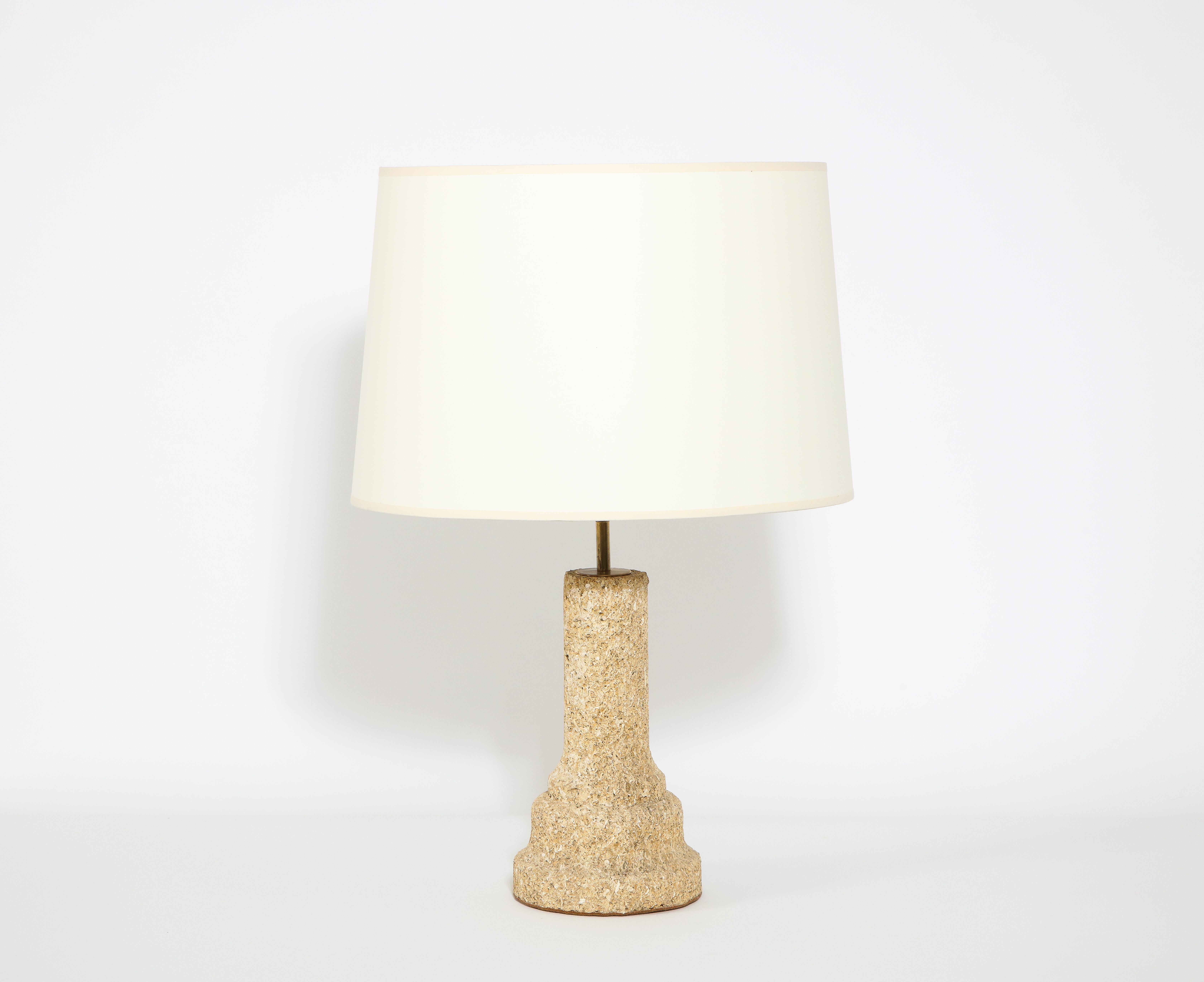 Unusual carved coral stone lamp with brass hardware. Rewired, shade for photographic purposes.