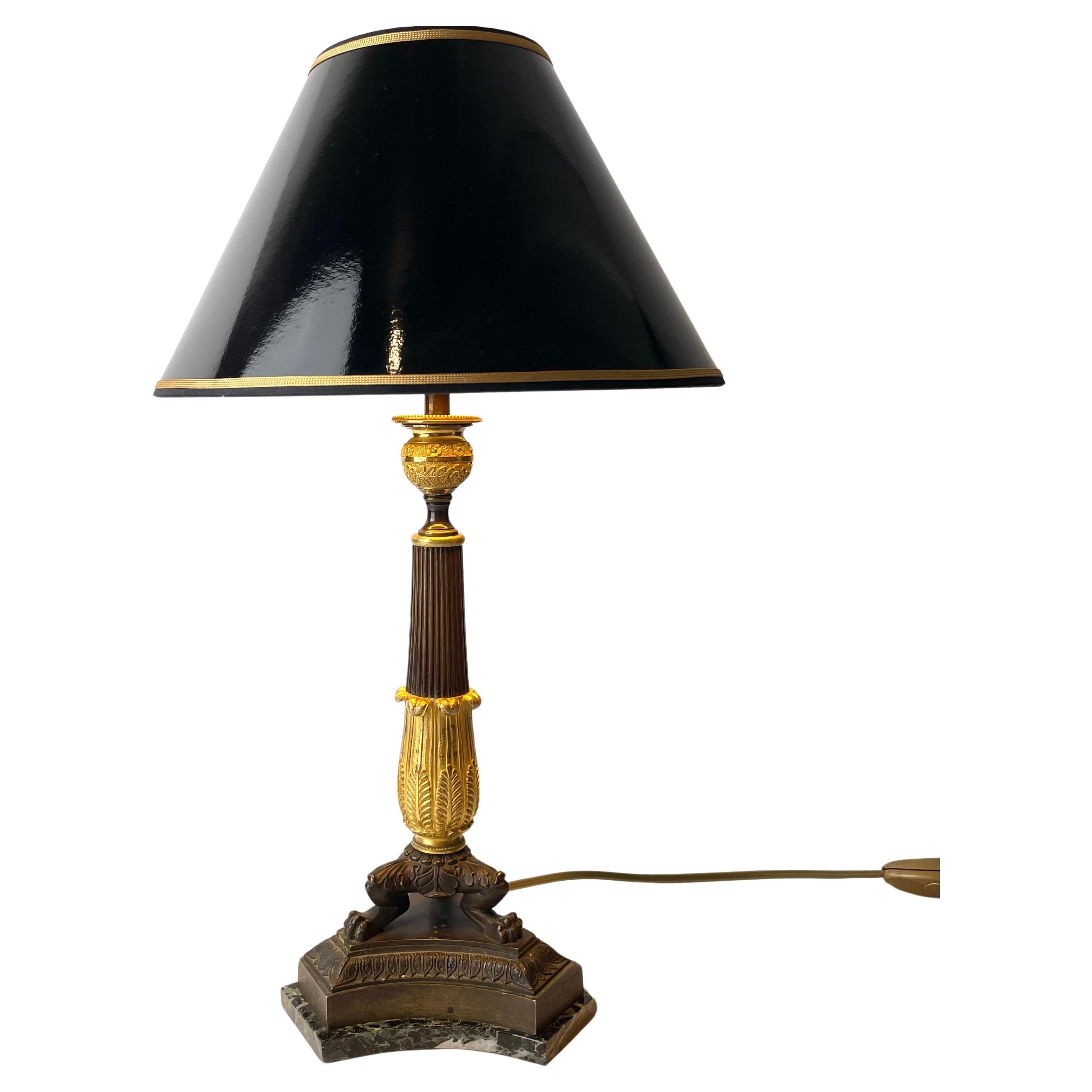 Table Lamp in gilded and dark patinated bronze with marble base. Empire 1820s For Sale