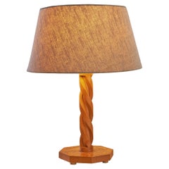 Lampada da tavolo in legno intagliato a mano e impiallacciatura di radica
