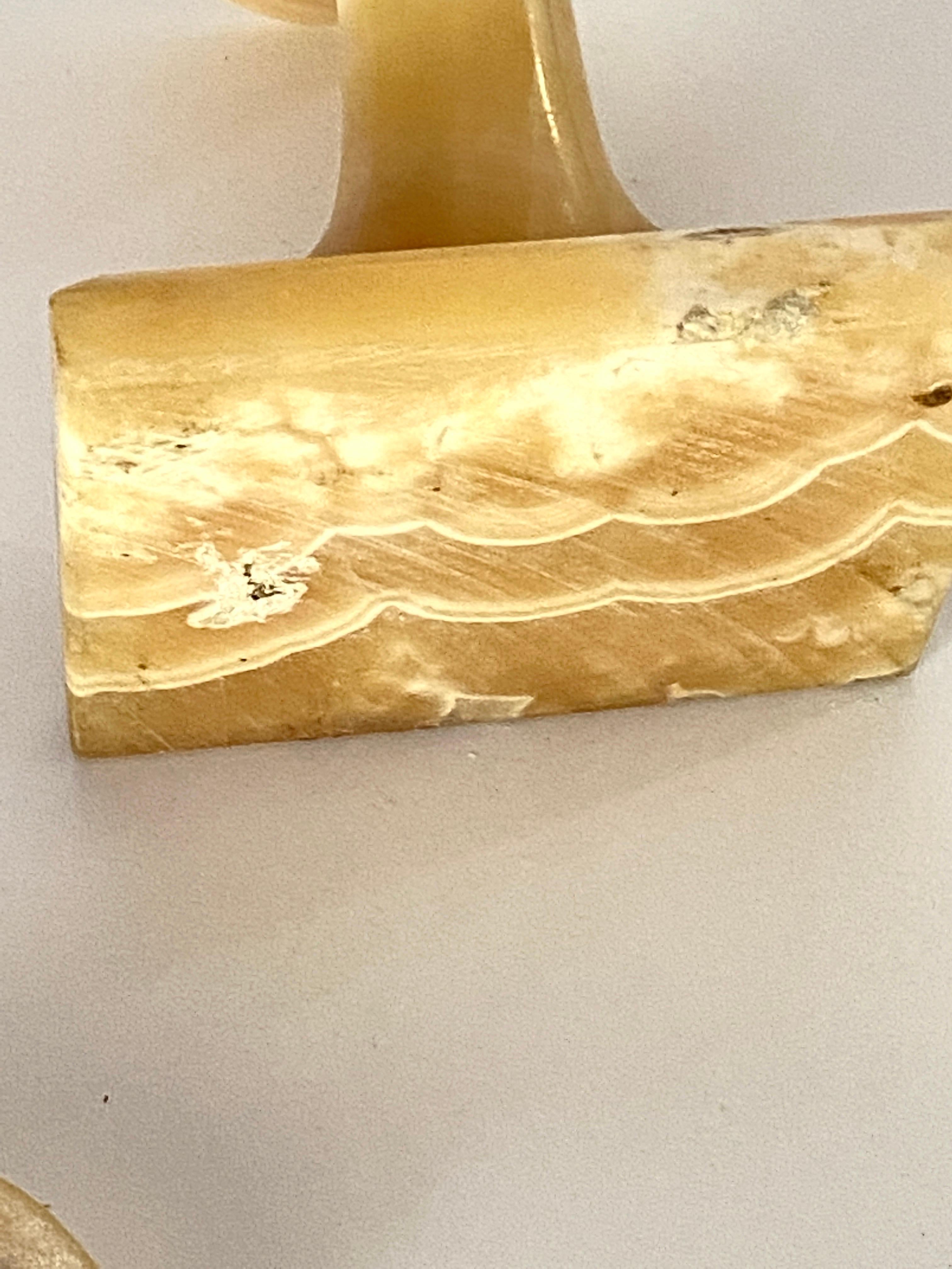 This table is in Onyx, representing an Egyptian character. Yellow color.
 