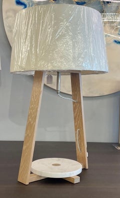 Table lamp in White Oak with a Marble base.