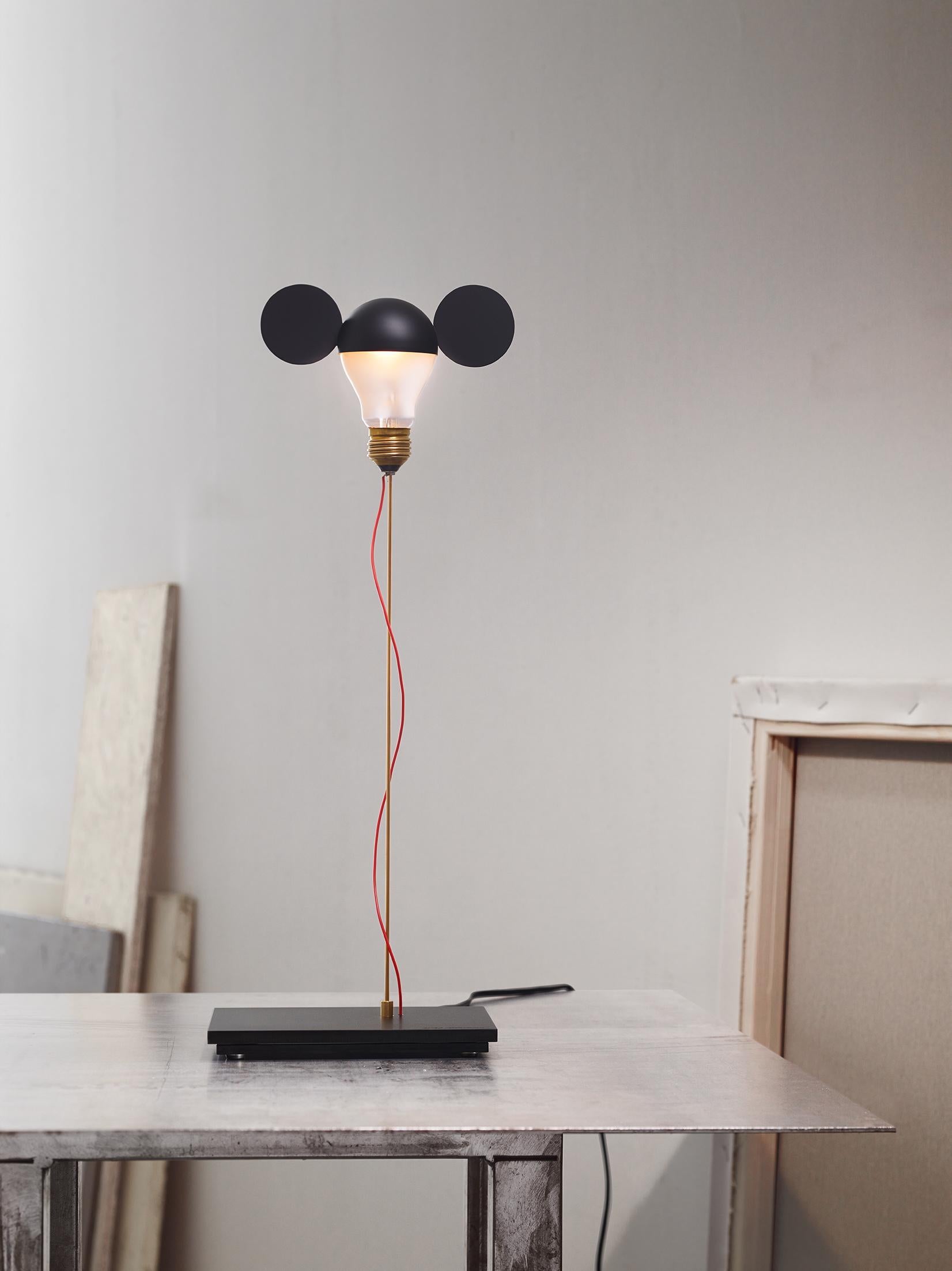 Model: I Ricchi Poveri – Toto (Black)
Designer: Ingo Maurer
Brand: Ingo Maurer

I Ricchi Poveri – Toto is the iconic table lamp with “ears,” crafted with a playful, sculptural character. Equipped with the exclusive Ambient LED light source developed