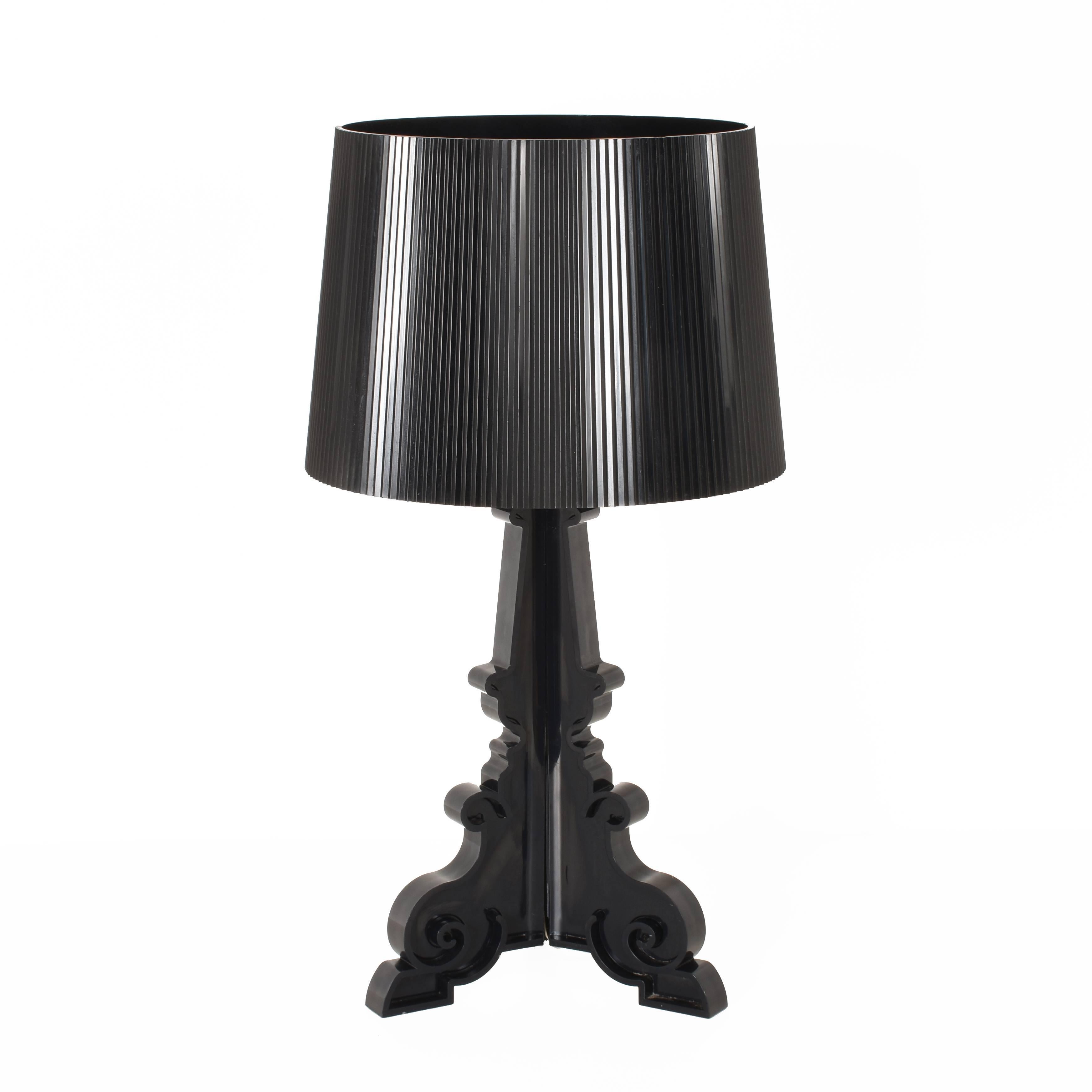 A lamp with an unmistakable style, a true best-seller by Kartell, Bourgie marvellously combines classicism, wealth and tradition with innovation and irony. The base, in Baroque style, consists of three decorated planes that intersect, while the