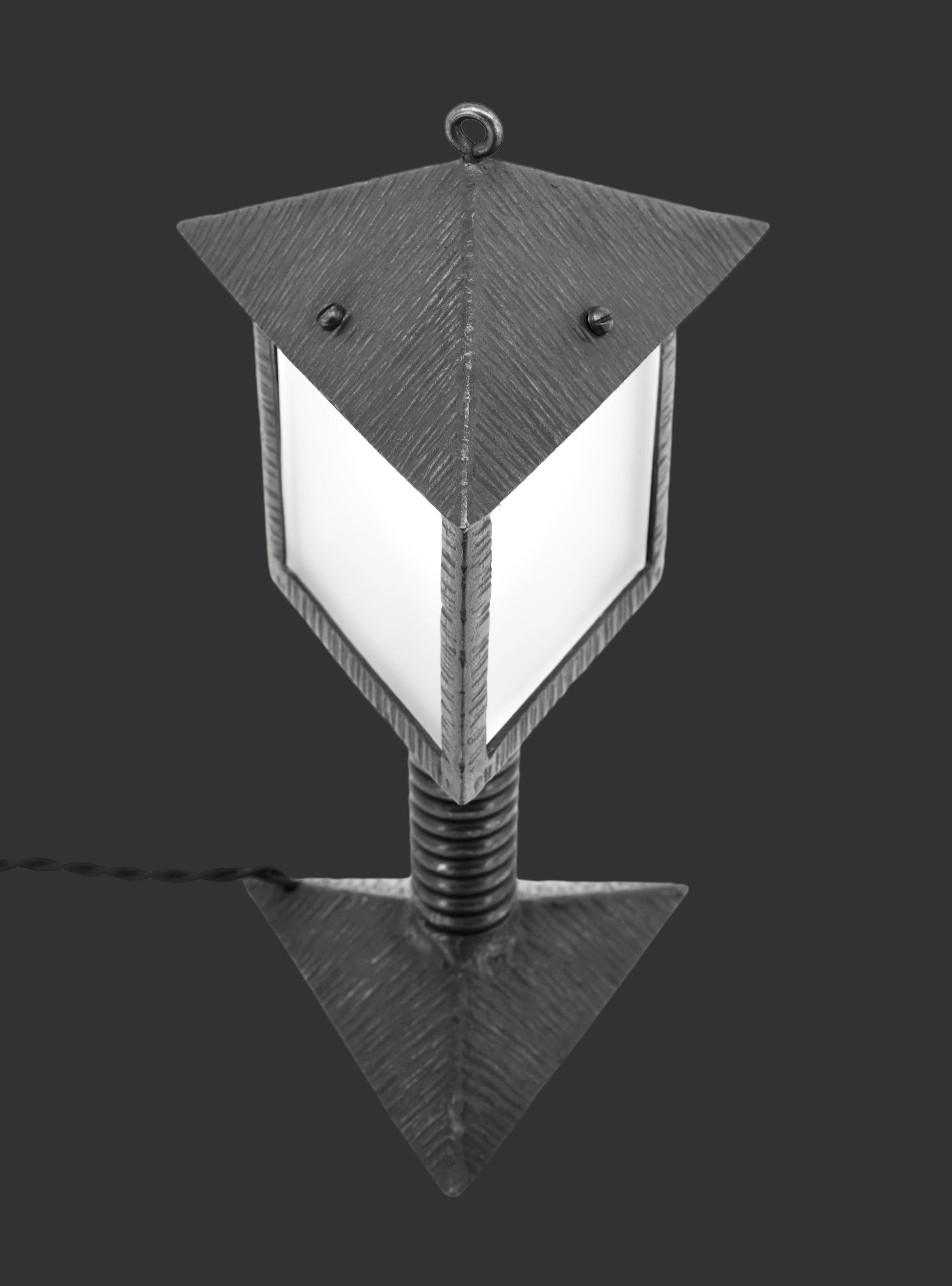 French Art Deco table lamp / lantern, France, 1920s. Can be used as a table lamp or lantern. Wrought-iron and glass. Height: 13