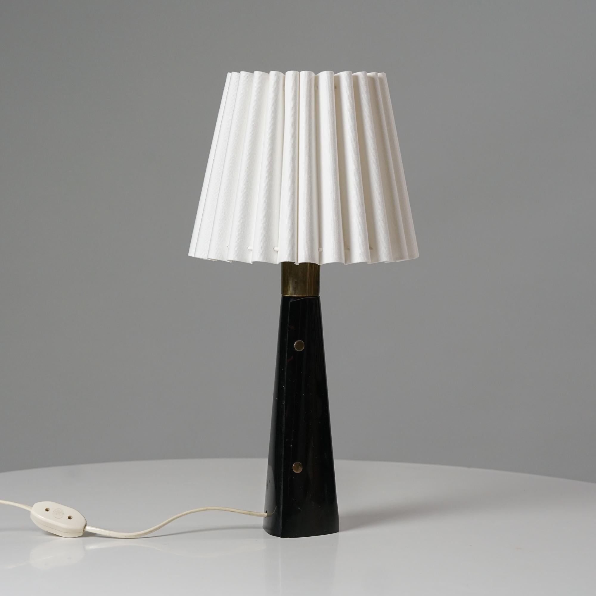 Table lamp by Lisa Johansson-Pape for Sanka Oy Finland from the 1960s. Acrylic, brass, cotton lampshade. Good vintage condition, minor patina and wear consistent with age and use. Iconic and timeless Lisa Johansson-Pape design. 