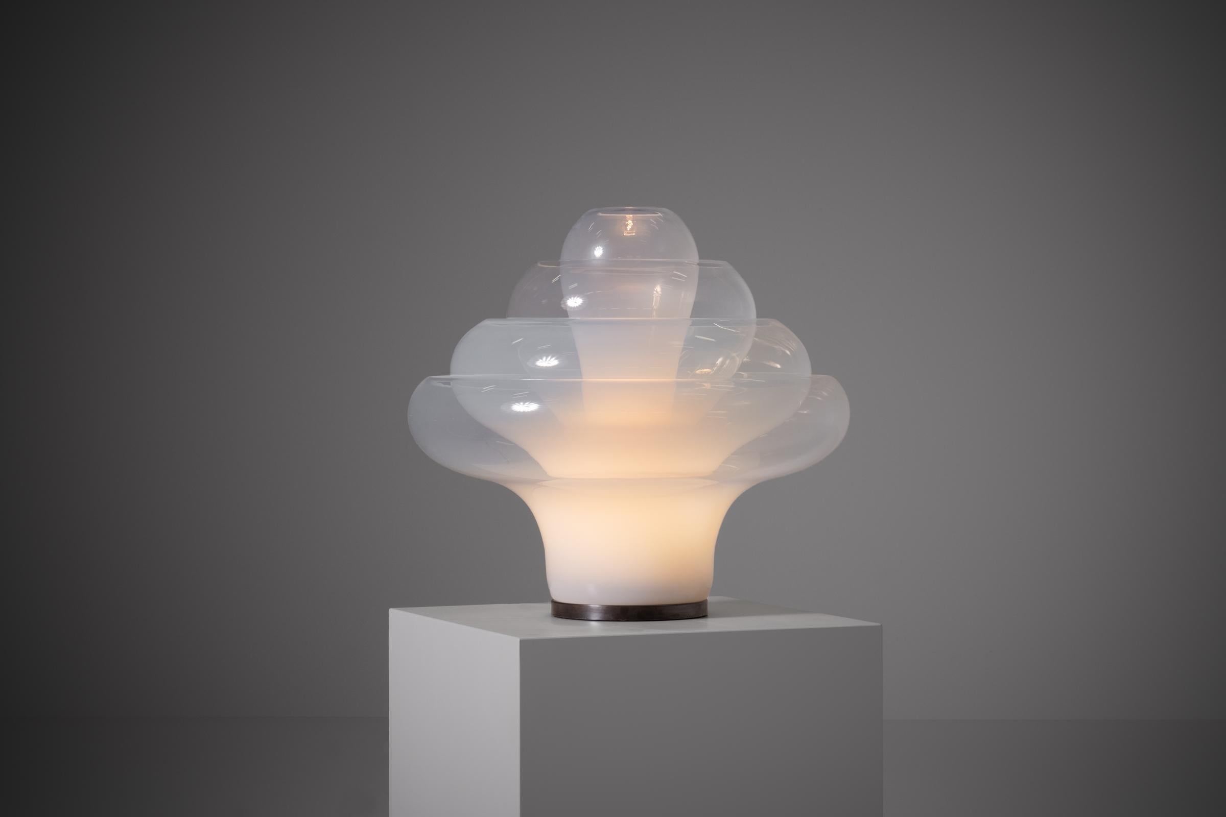 Model LT305 'Lotus' table lamp by Carlo Nason for Mazegga, Italy 1960s. This extraordinary lamp is made from mouth-blown opaline glass and consists of four interlocking individual pieces, that give the lamp its iconic flower-like appearance.