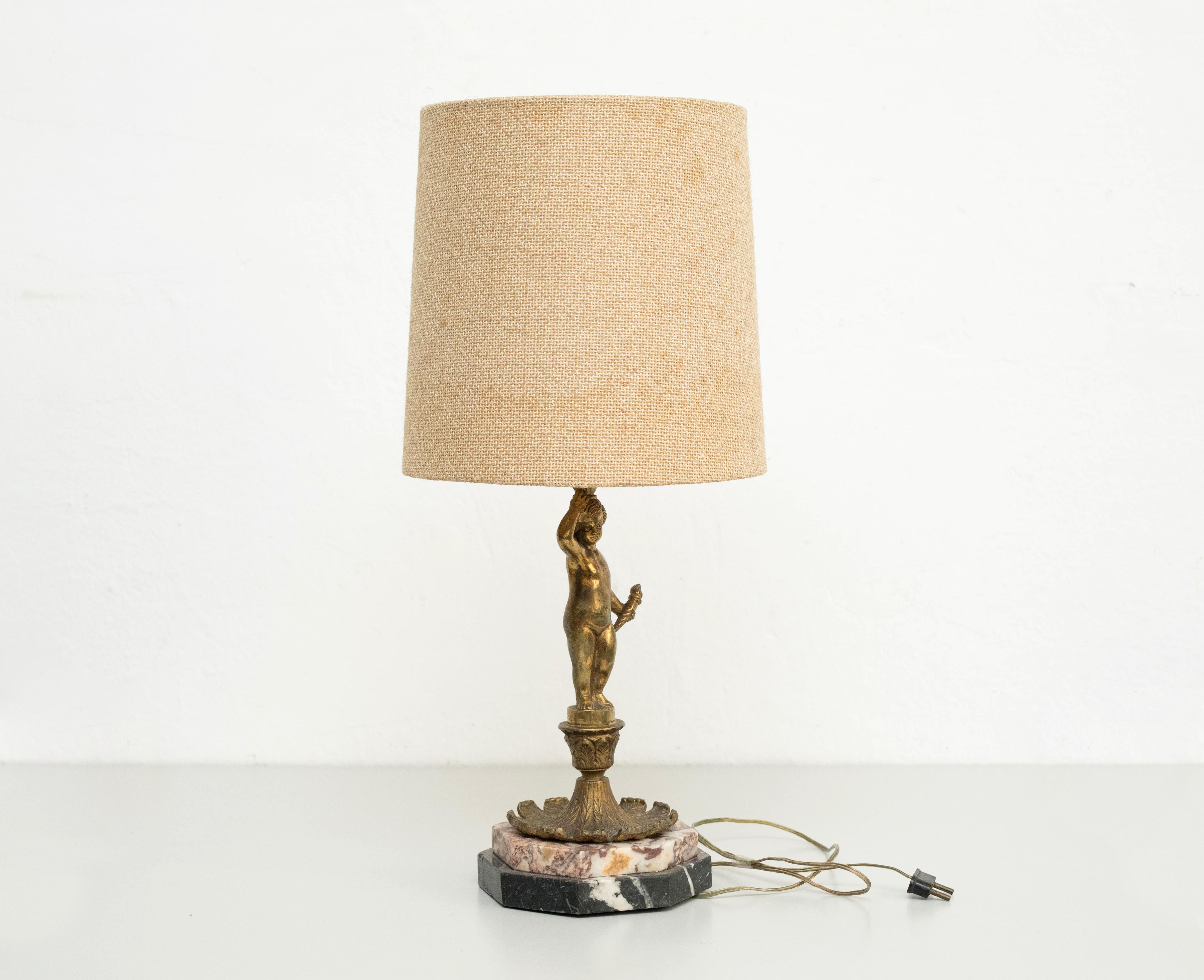 Table lamp, metal and marble, Circa 1950.

In original condition, wear consistent with age and use, preserving a beautiful patina.

Materials:
Metal and Marble

Dimensions:
ø 24 cm x H 55.5 cm.

Elecrtification has not been tested. Wired for Europe.