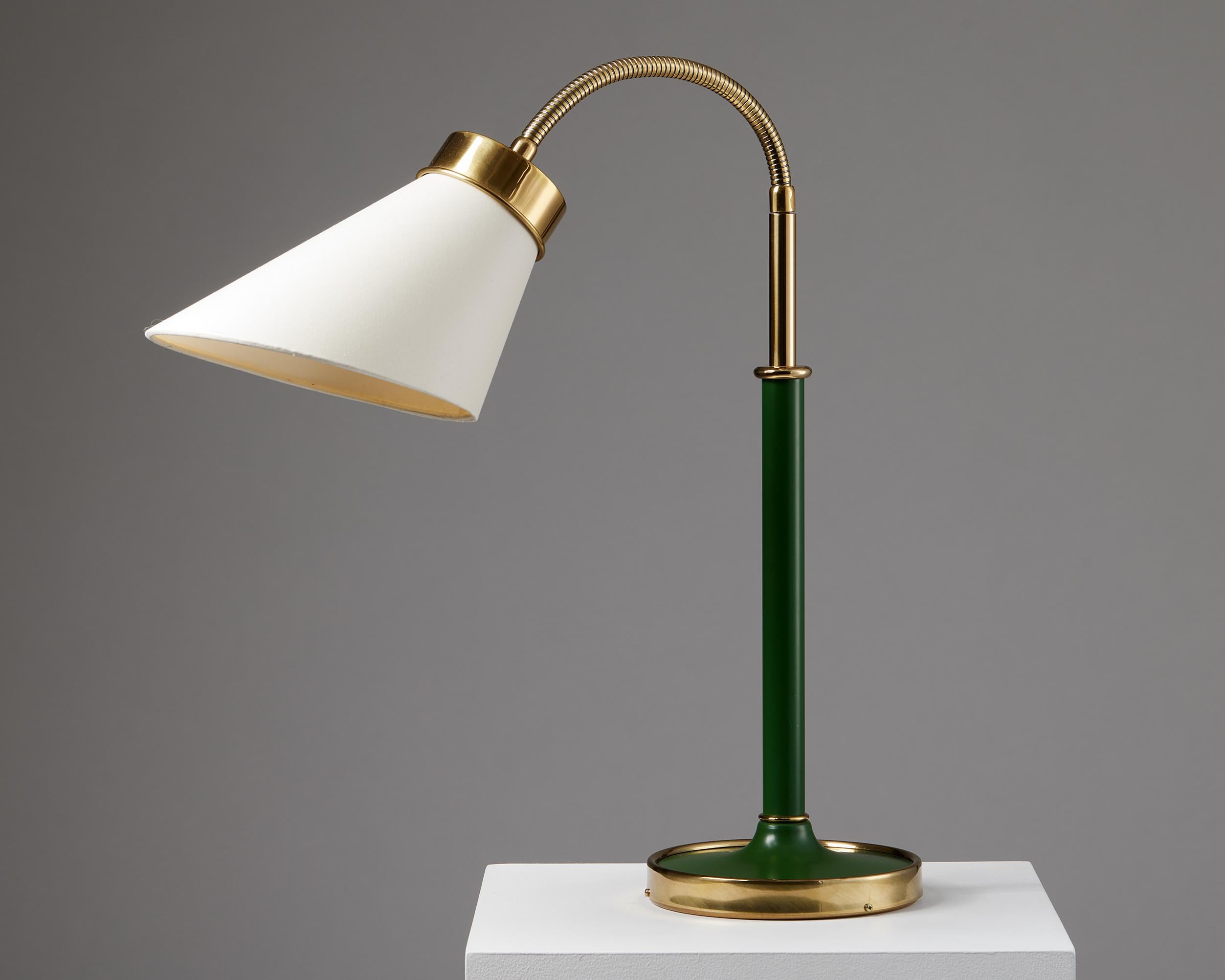 Table lamp model 2434 designed by Josef Frank for Svenskt Tenn,
Sweden, 1939.
Polished and lacquered brass with fabric shade.

Measures: H: 58 cm / 1' 10 1/2