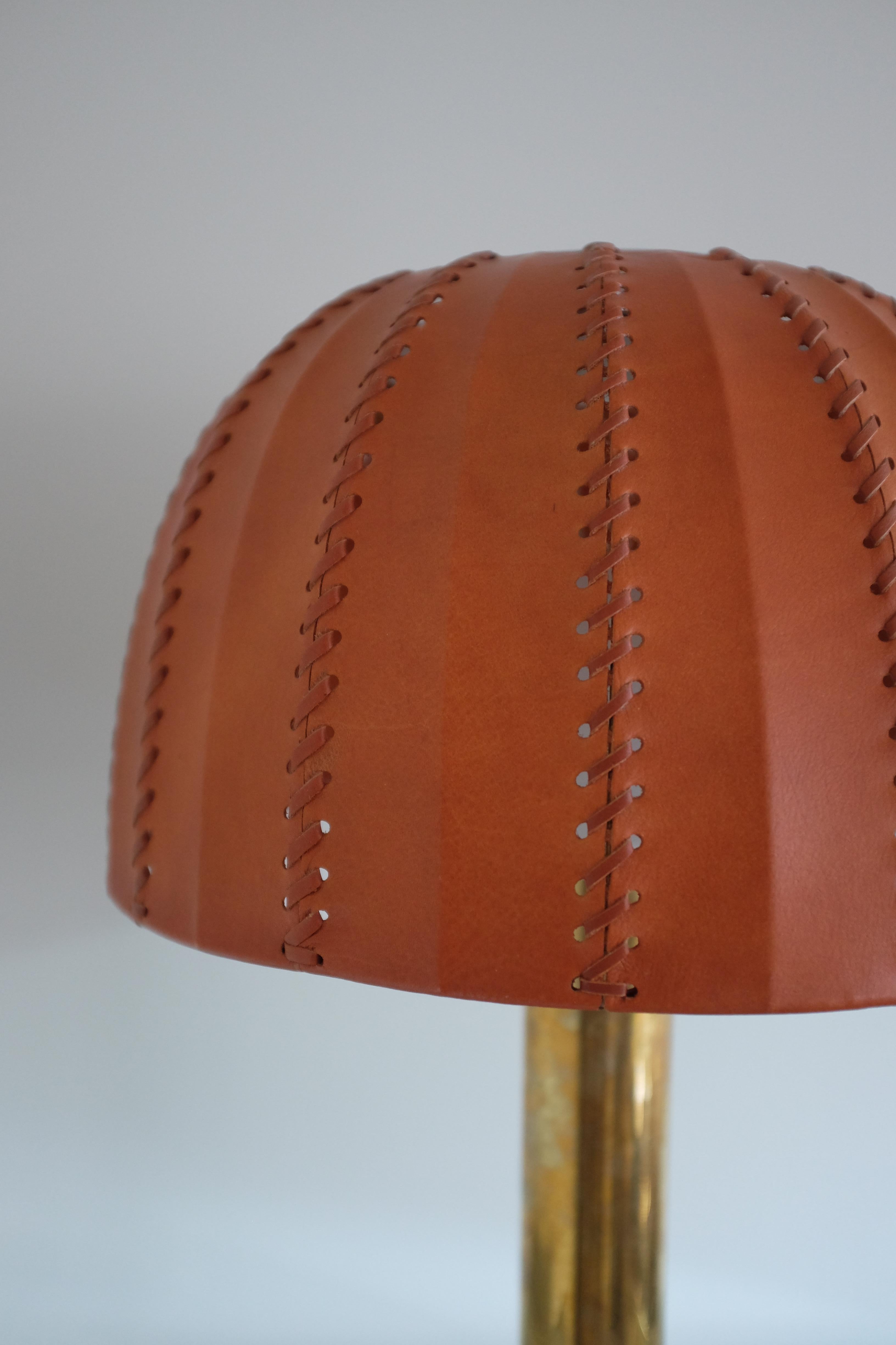 Rare Leather and Brass Table lamp in modell B204 or also known as 