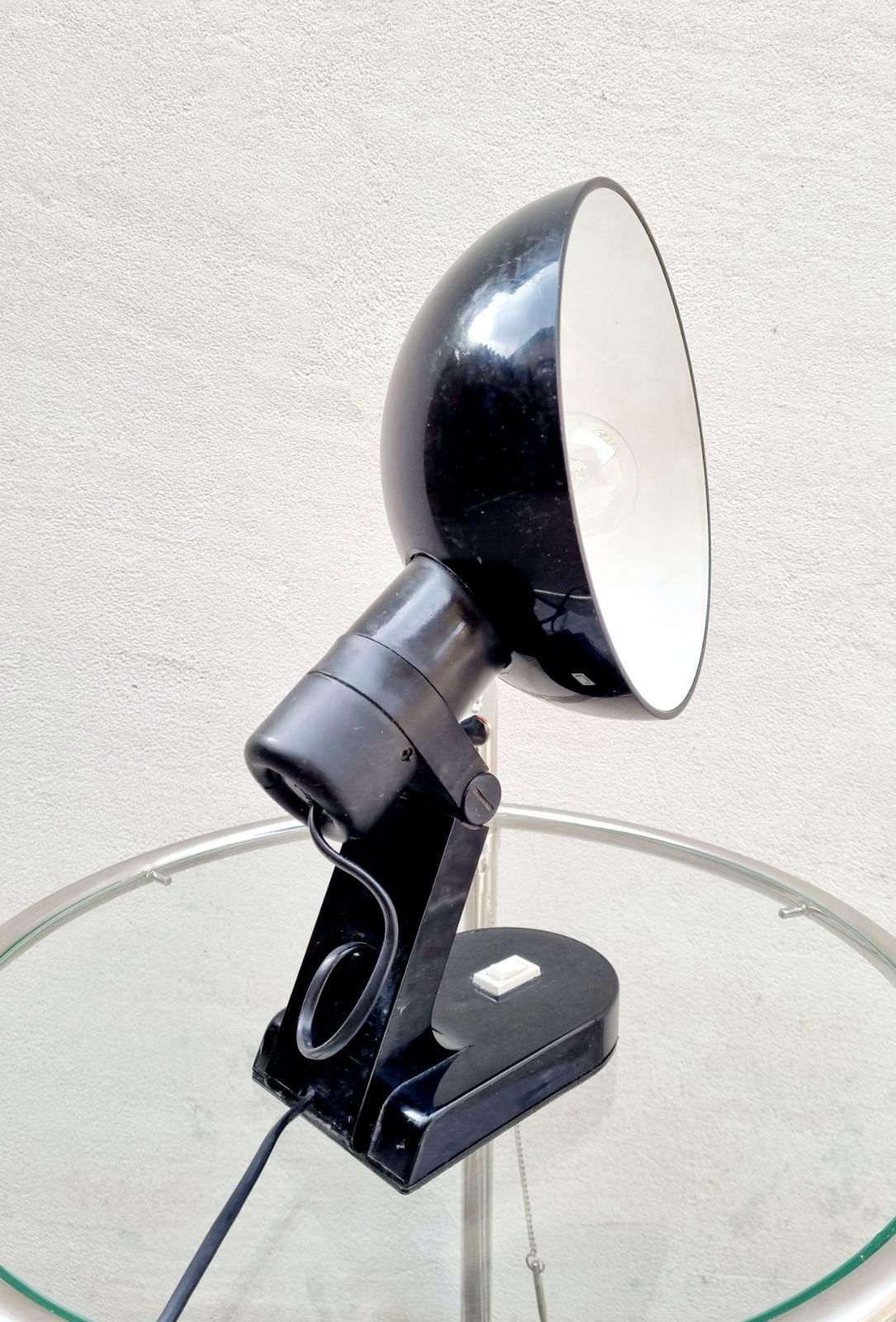 Original iGuzzini Desk Lamp was made in 70's in Italy. It was designed by Bruno Gecchelin for Guzzini. Model Paxis Notte.

This awesome Lamp is in great vintage condition. No rust, bends or dents. Minor wear of use.