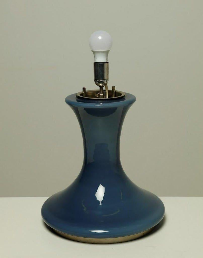 Table lamp with Murano glass is a fashionable lamp designed by Carlo Nason (1935) for Selenova, from chromed metal and Murano glass, realized in the 1960s in Italy.

Very good condition.

Carlo Nason (1935 Murano), is a famous Italian glass