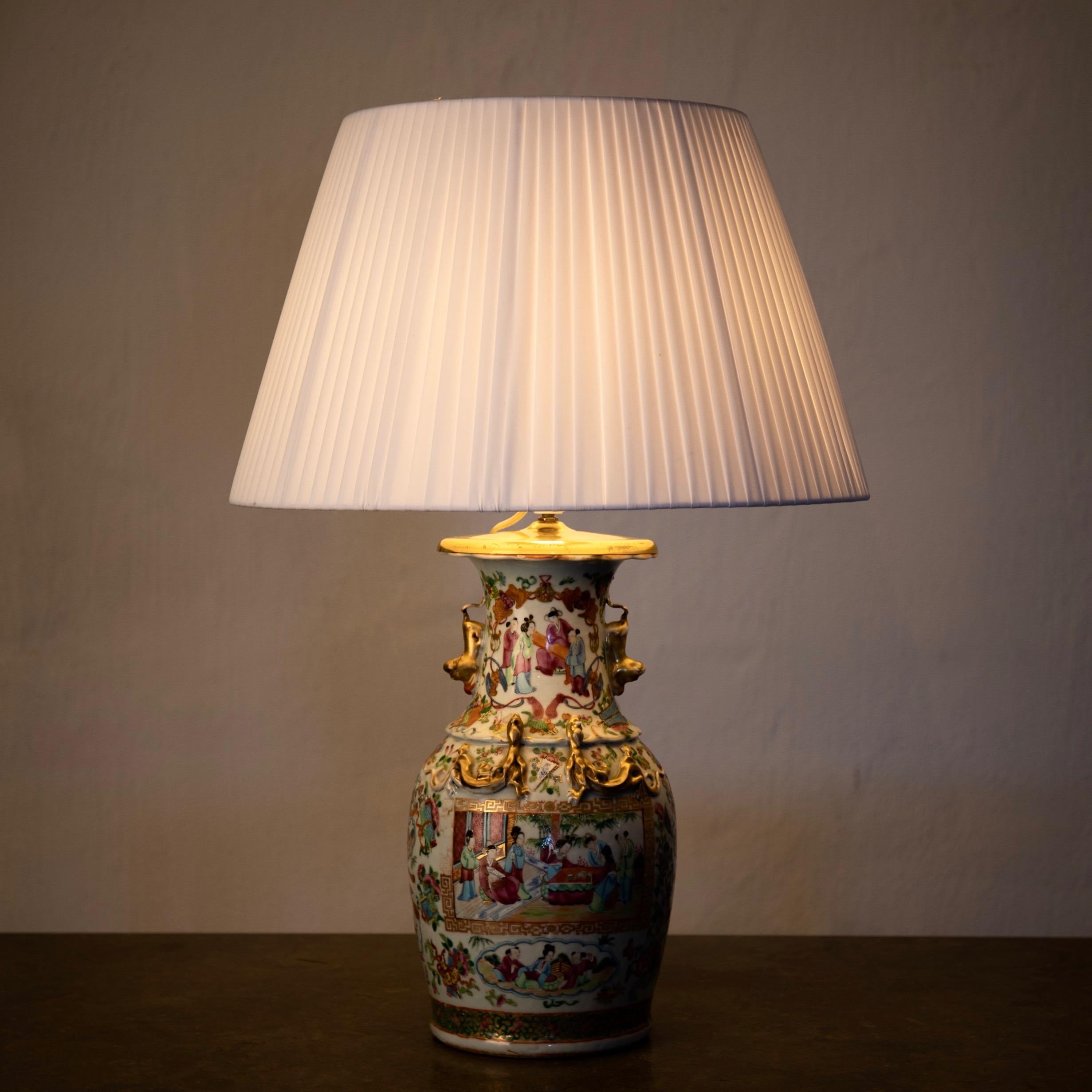 Table lamp oriental colors 19th century, China. A table lamp made during the 19th century in China. Multicolored with gilded details.