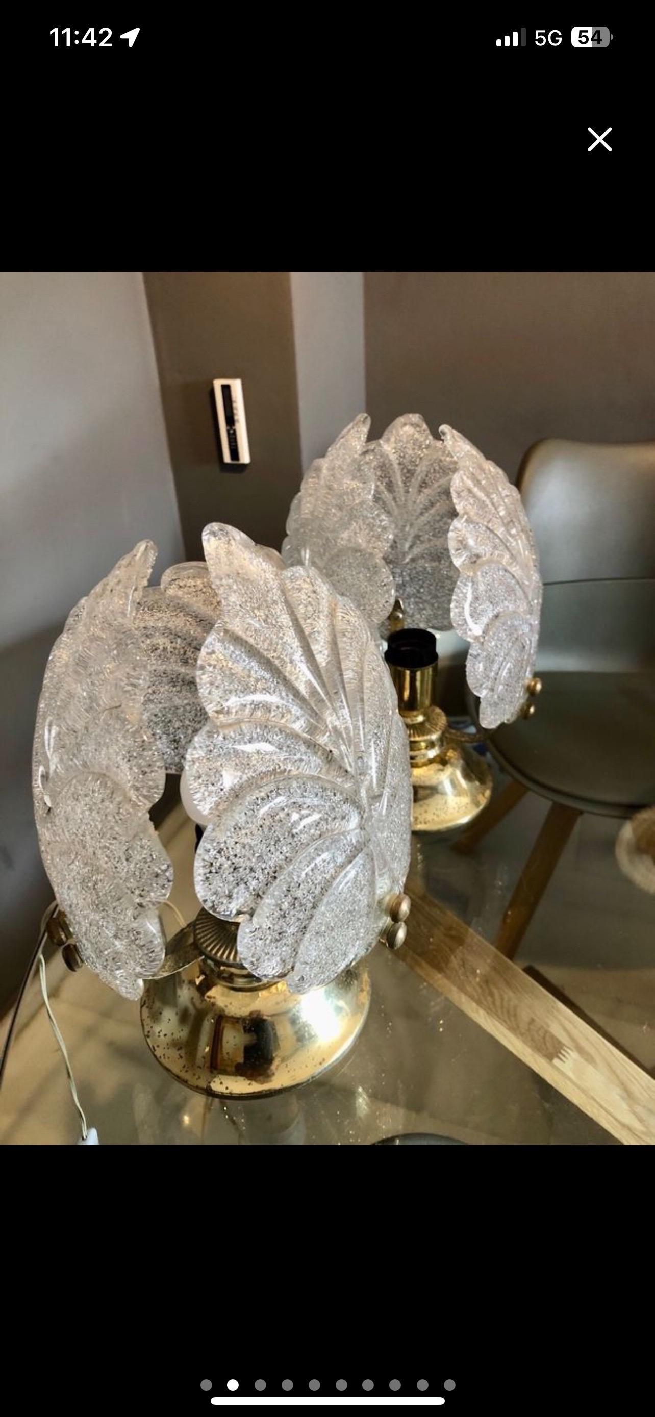 Mazzega table lamp murano glass with in hand made glass. The design and the quality of the glass make this piece the best of the design.

This wall lighting pair are in good condition.please check picture .
little original defect for one hole to