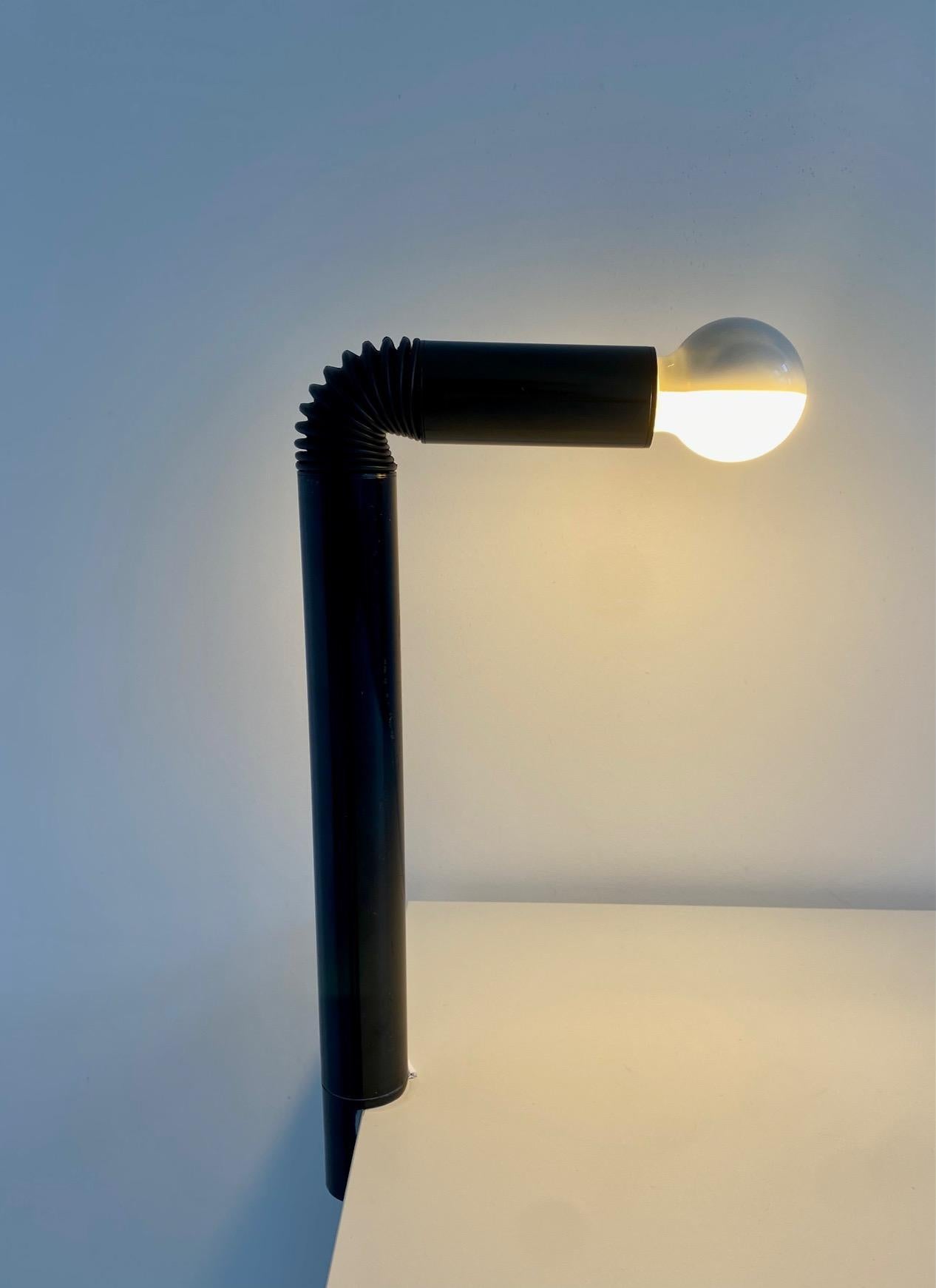 Periscopio table lamp with clamp by Danilo and Corrado Aroldi for Stilnovo, 1967.

As described in Stillovo Catalogue No. 30: 