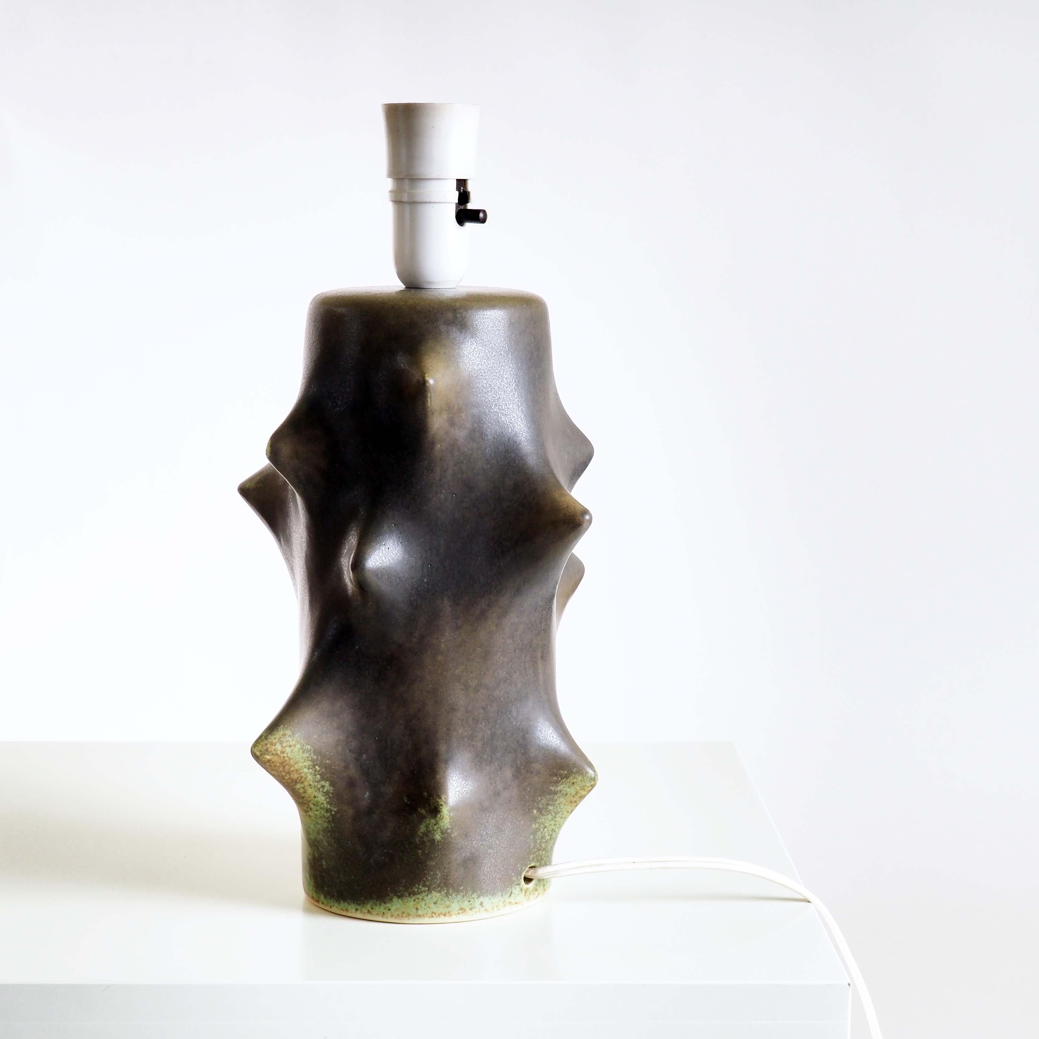 Rare lamp base by Knud Basse. Beautiful glaze and exceptional sculptural form.