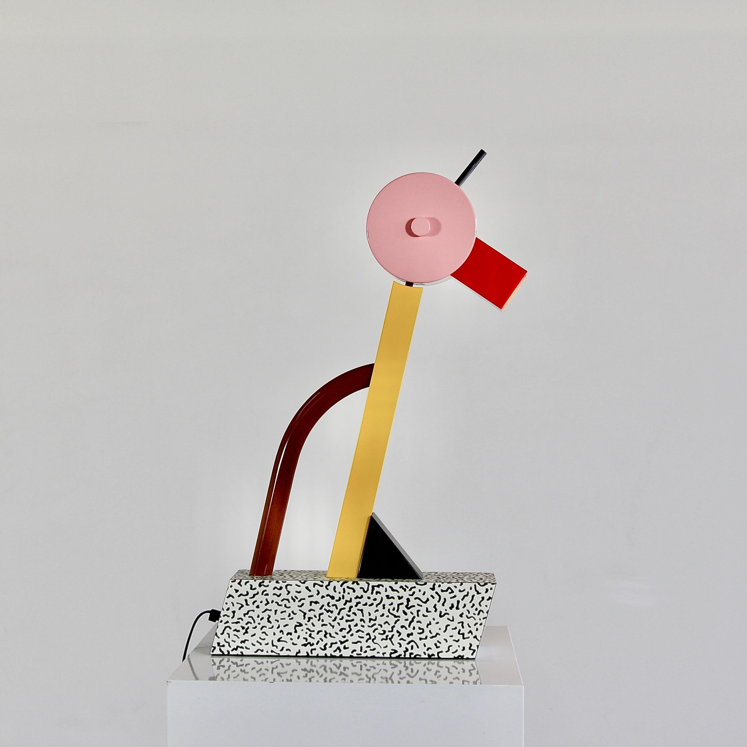 Metal construction, wooden base with laminate and head with halogen lamp, 'The Duck'. With original metal label.

Reference: Fiell. 1000 Lights. 1960 to present. P. 316, illustrated.

Ettore Sottsass (14 September 1917 – 31 December 2007). Italian