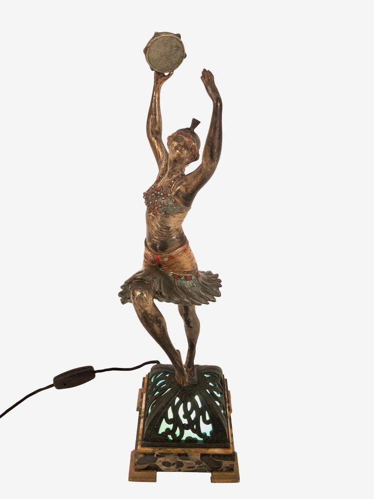 Lighted sculpture made in “Régule” (spelter)
The Tambourine dancer
Original Art Deco, France, 1930s
Original Partina in very good condition – the color is not very attrited
Slight hair crack in the foot. 

Dimensions:
Width: 15 cm
Height: 53