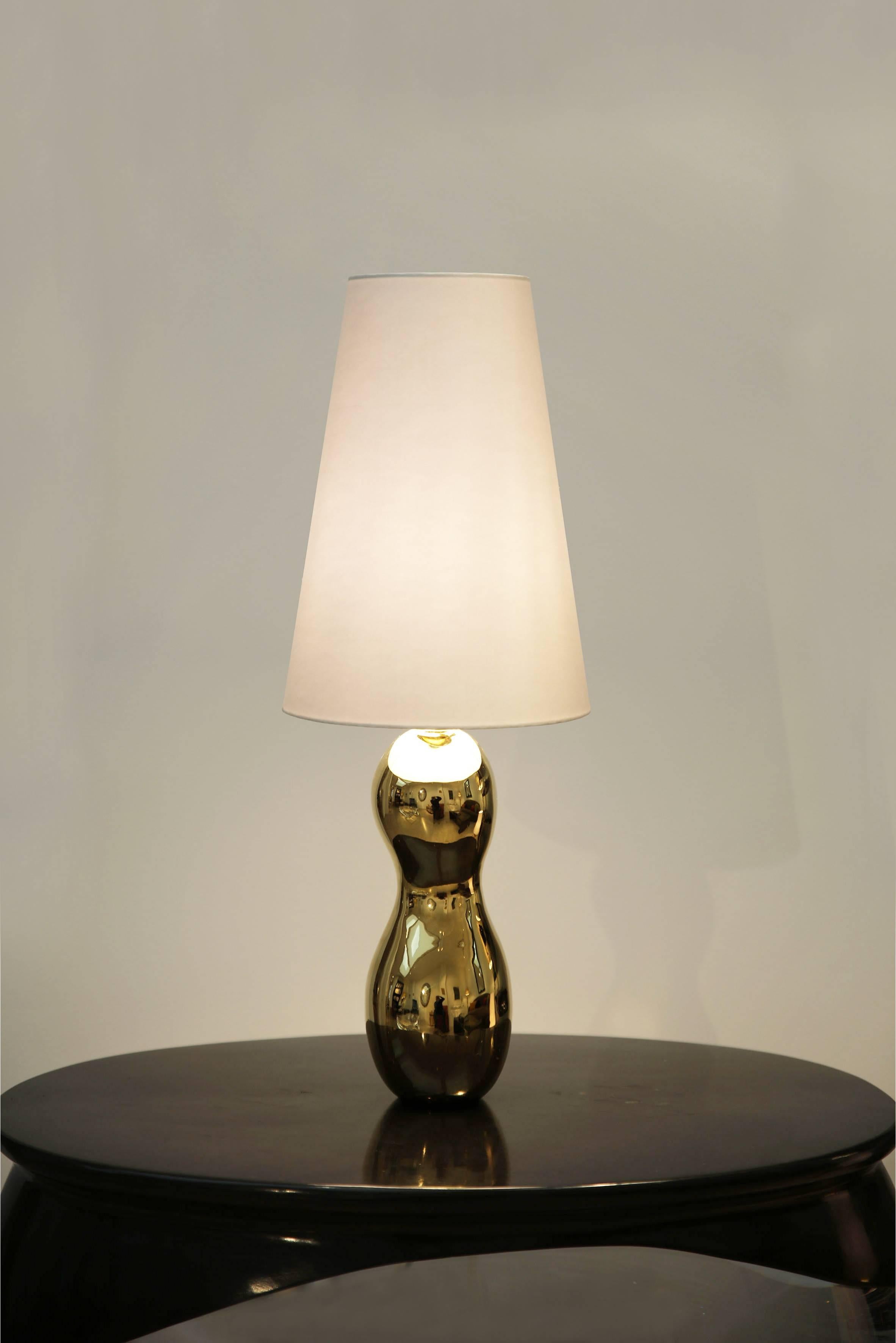 Sold individually. Price is per table lamp. There are two available. 

Garouste & Bonetti
Table Lamp 'Three Graces' 
1999
Gold plated bronze
H63 x Diam. 24cm / 24.8 x Diam. 9.4 in
BG99-22

For EU buyers this piece is subject to a 20% VAT tax, which
