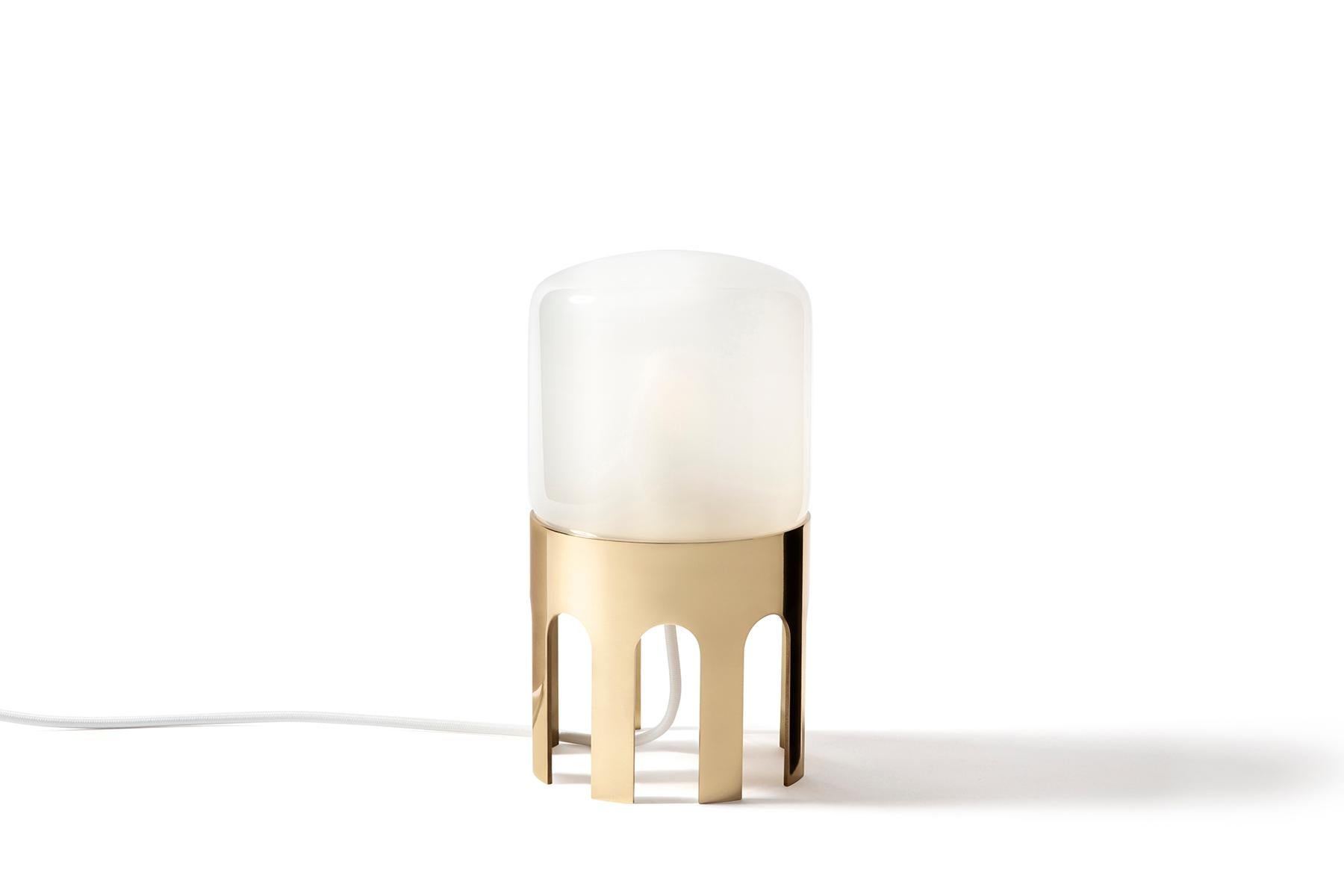 Table lamp inspired by the architecture of water towers, made in polished brass and blown glass diffuser.
Design GoodMorning Studio for Daythings  

(These are products made in Italy by artisanal processes. Material and color variation and slight