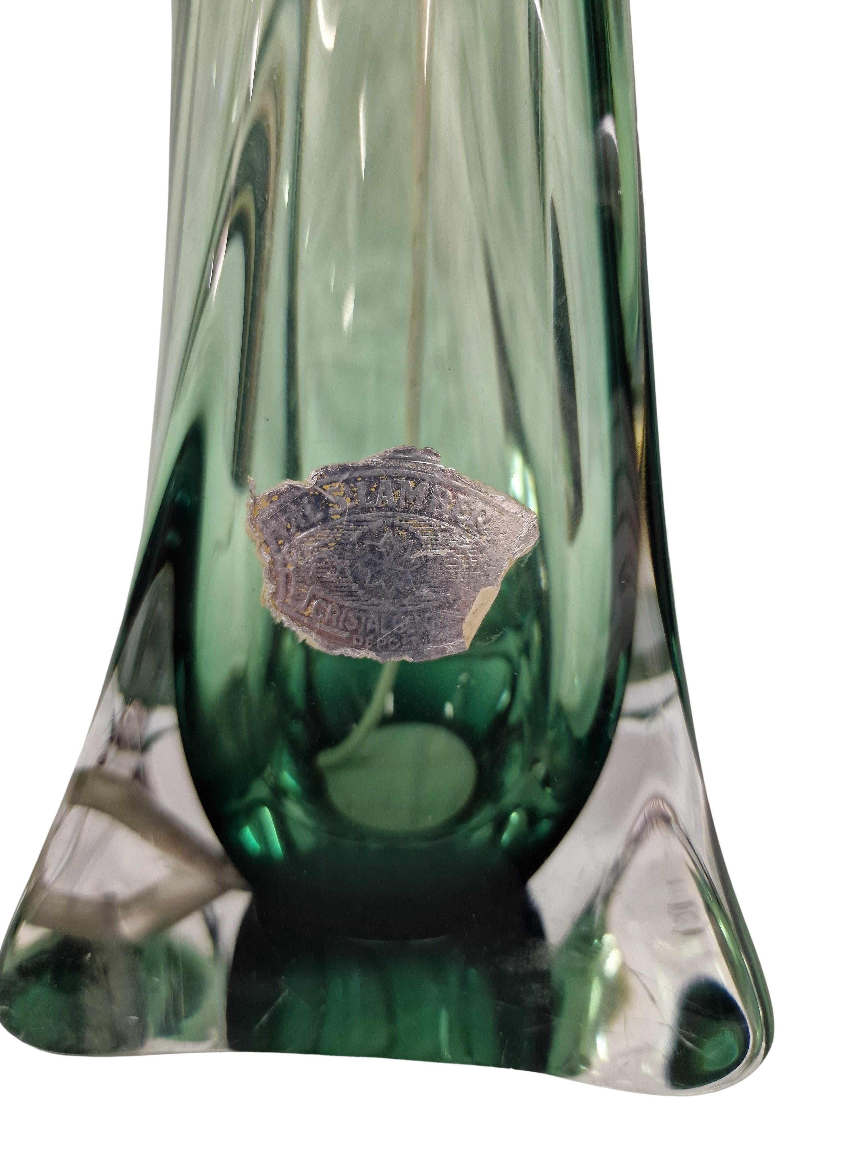 Beautiful crystal table lamp, made by the famous Belgium Crystal manufacturer Val Saint Lambert, made in the 1950s. 

The lamp is beautifully made with very heavy crystal glass in an interesting and elegant form and wonderful green color. The lamp