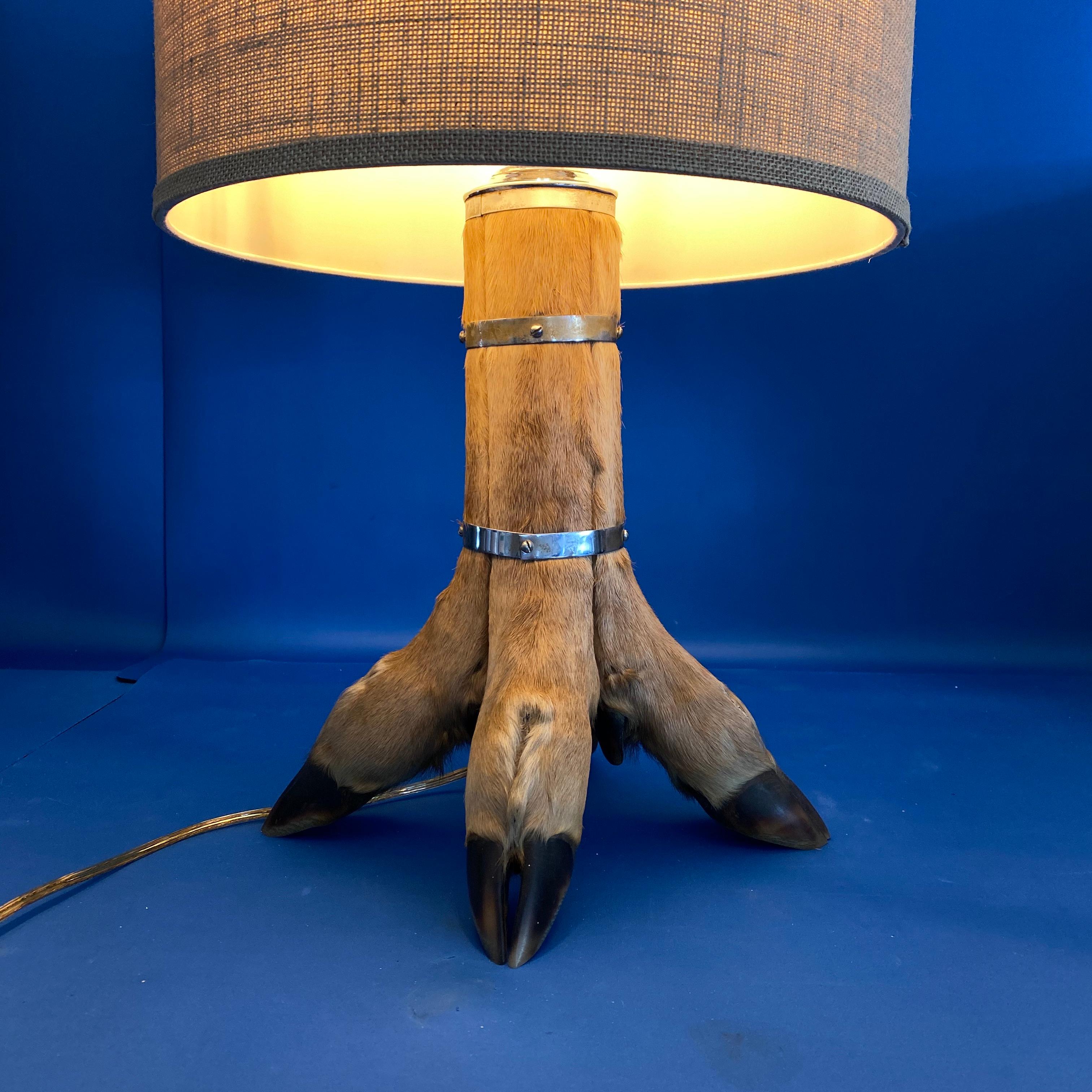 Organic Material Table Lamp With 4 Tier Deer Hoof With Nickel Bands And Antler Finial For Sale