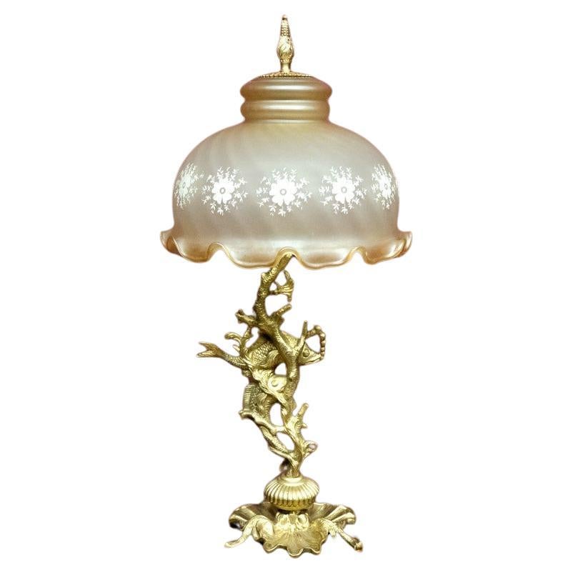 Table lamp with a tall base.
