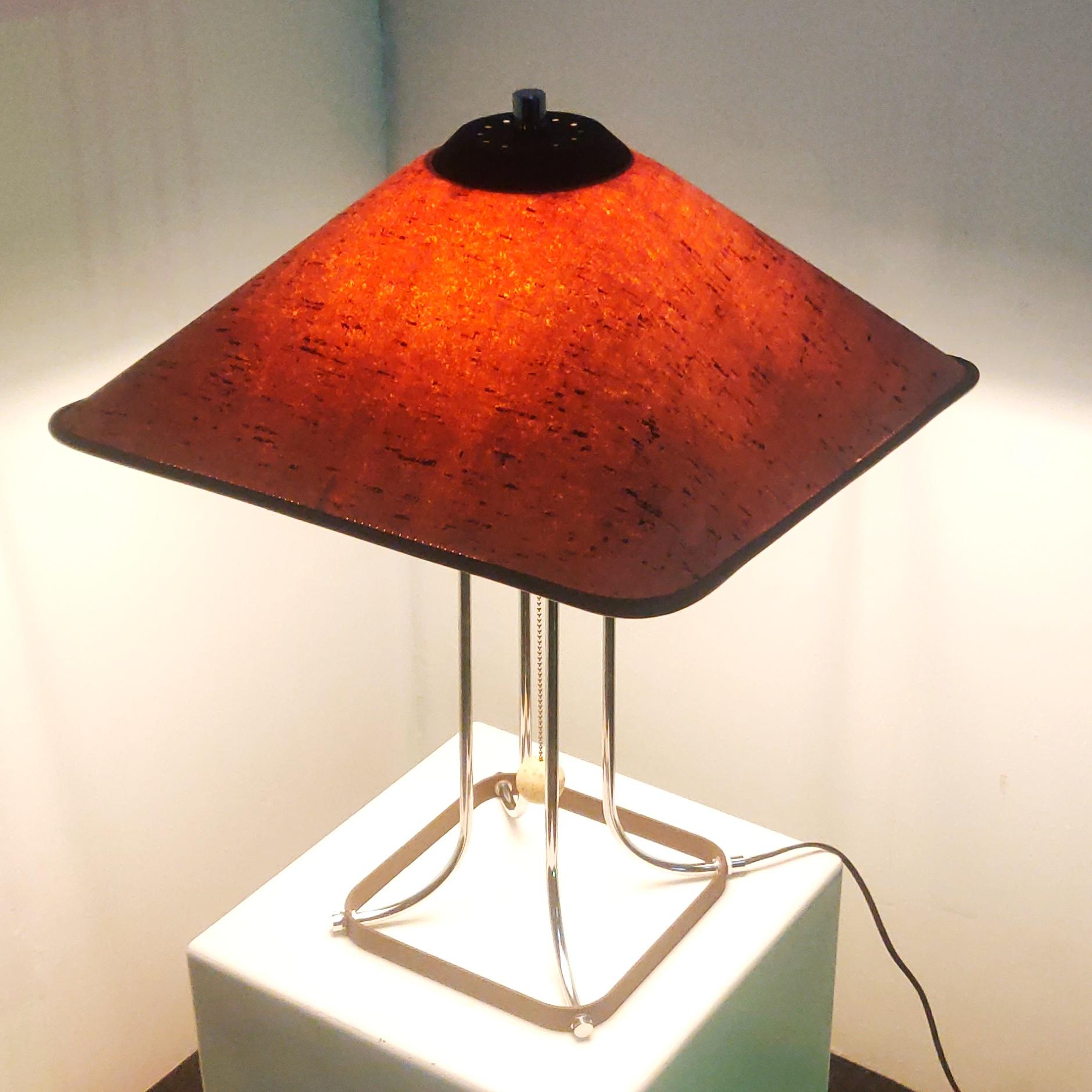 Rare table lamp with chrome and cork accents and a cork alike shade, by Herda for Lampadari 3 Luci, 1970s

Herda Lighting company, founded 1946 in Amsterdam by the brothers Daniels. Designers working for Herda , Willem van Oyen sr., Jaap Tiepel,