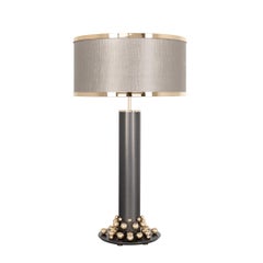 Table Lamp with Cylindrical Design Featuring Brass Base and Pearl Accents