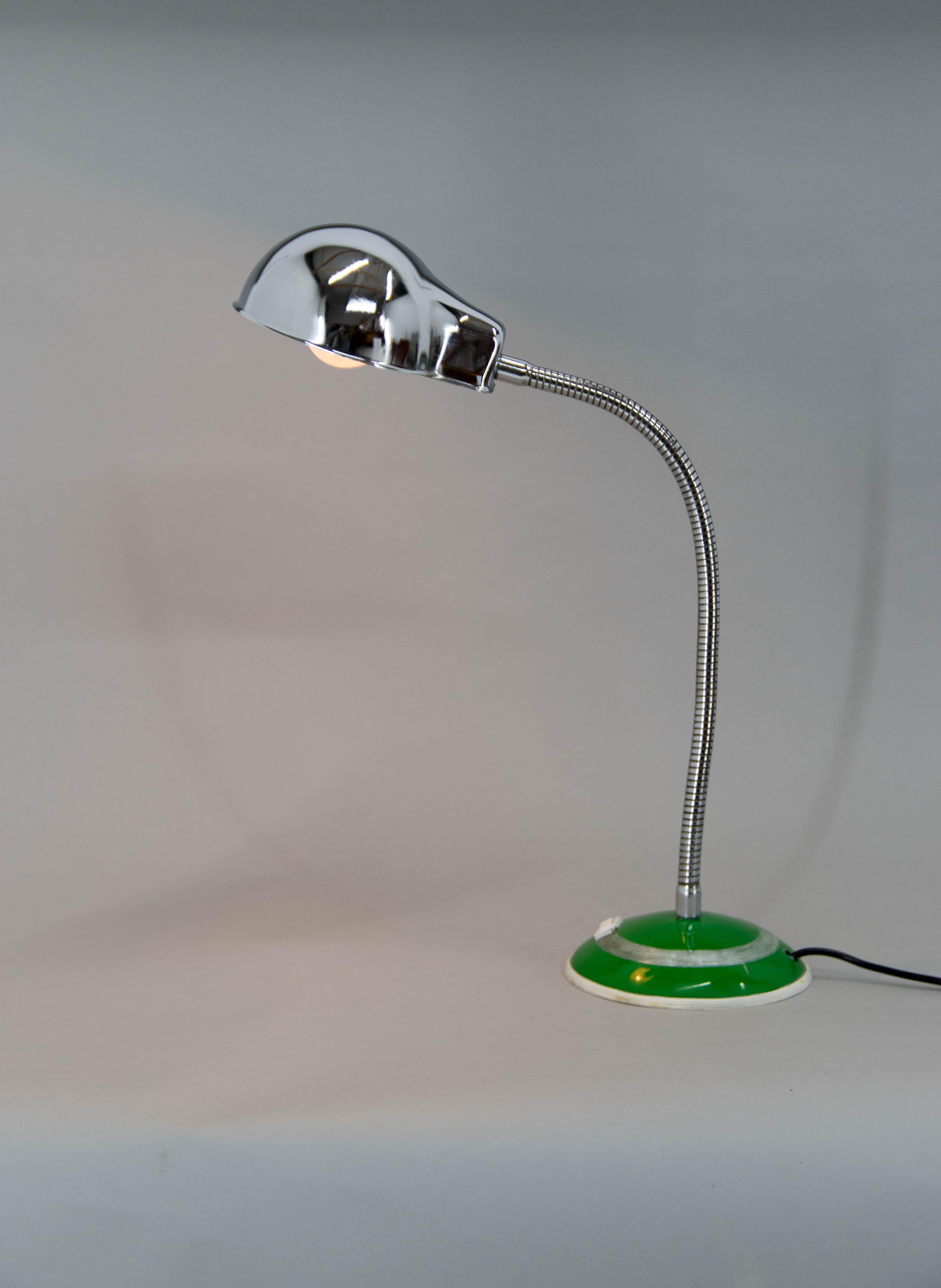Table lamp with flexible shade made in 1950s
Very good original condition.
1x40W, E25-E27 bulb
US plug adapter included.
 