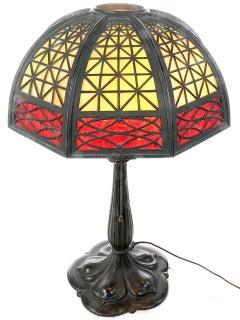 Table Lamp with Heavy Latticework Filigree and Red/Amber Glass