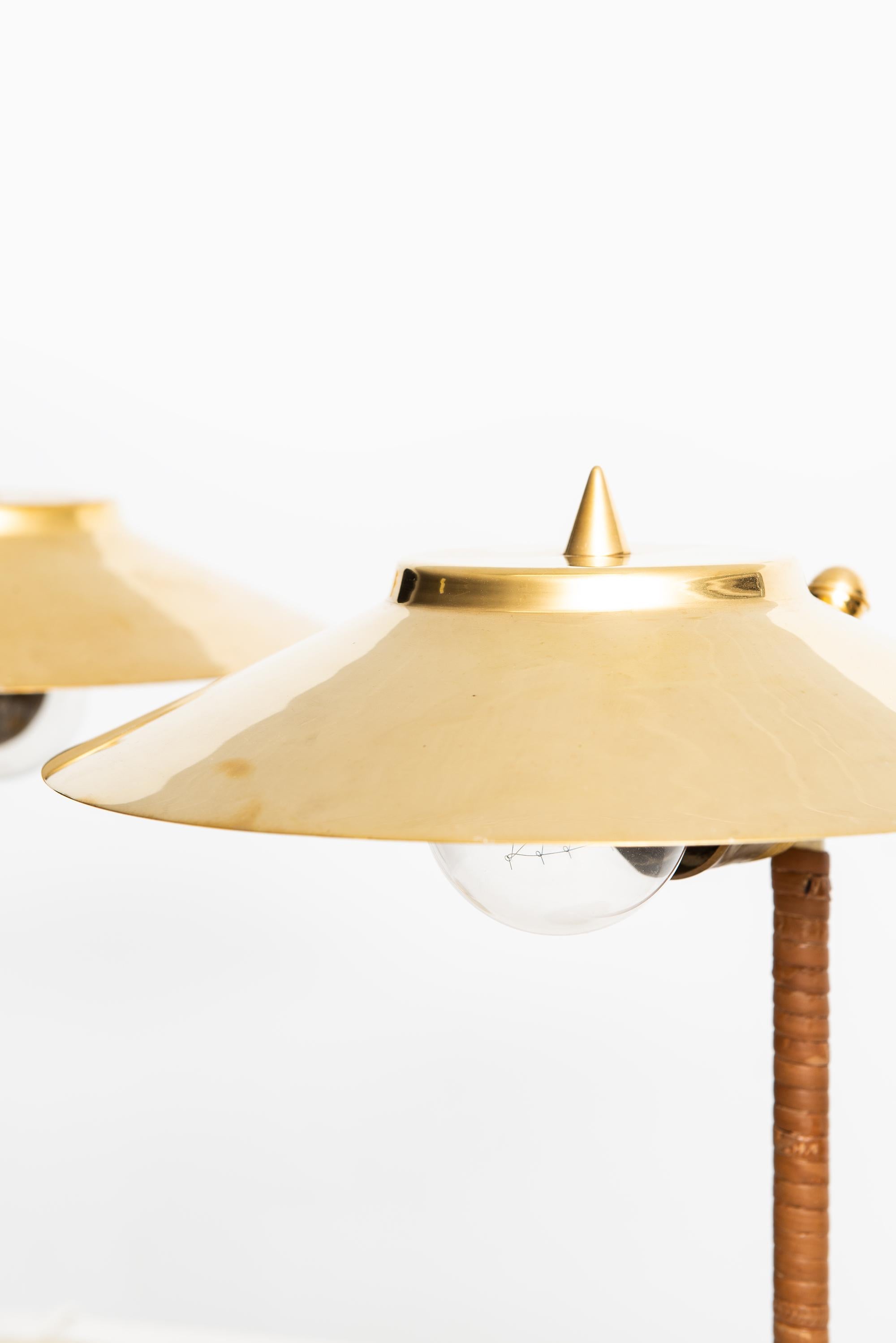 Very rare pair of table lamp attributed to Paavo Tynell. Produced by Idman in Finland for a Hotel in Helsinki.