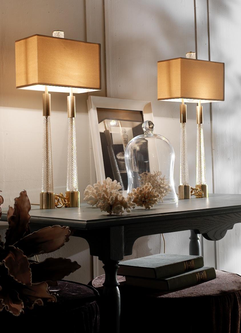 Bronze table lamp in golden satin finish. Handcut crystal columns and details. Ivory velvet lampshade.