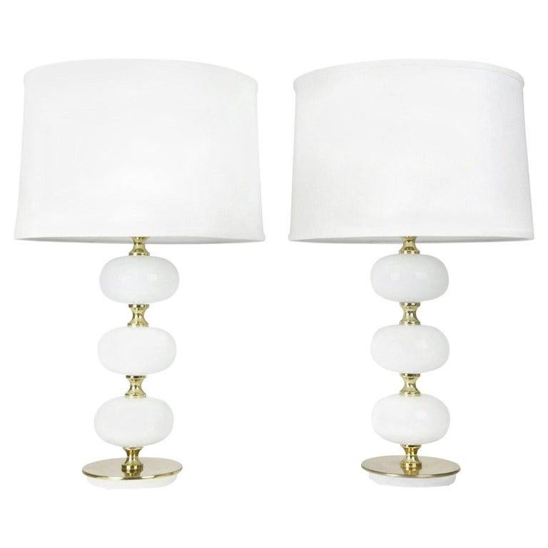 Midcentury pair of Tranås AB Stilarmatur table lamps white mouth blown opaline glass balls on a brass base, 1970s, Sweden.
Three white individual mouth blown glass balls on a heavy polished brass base in excellent original condition high quality