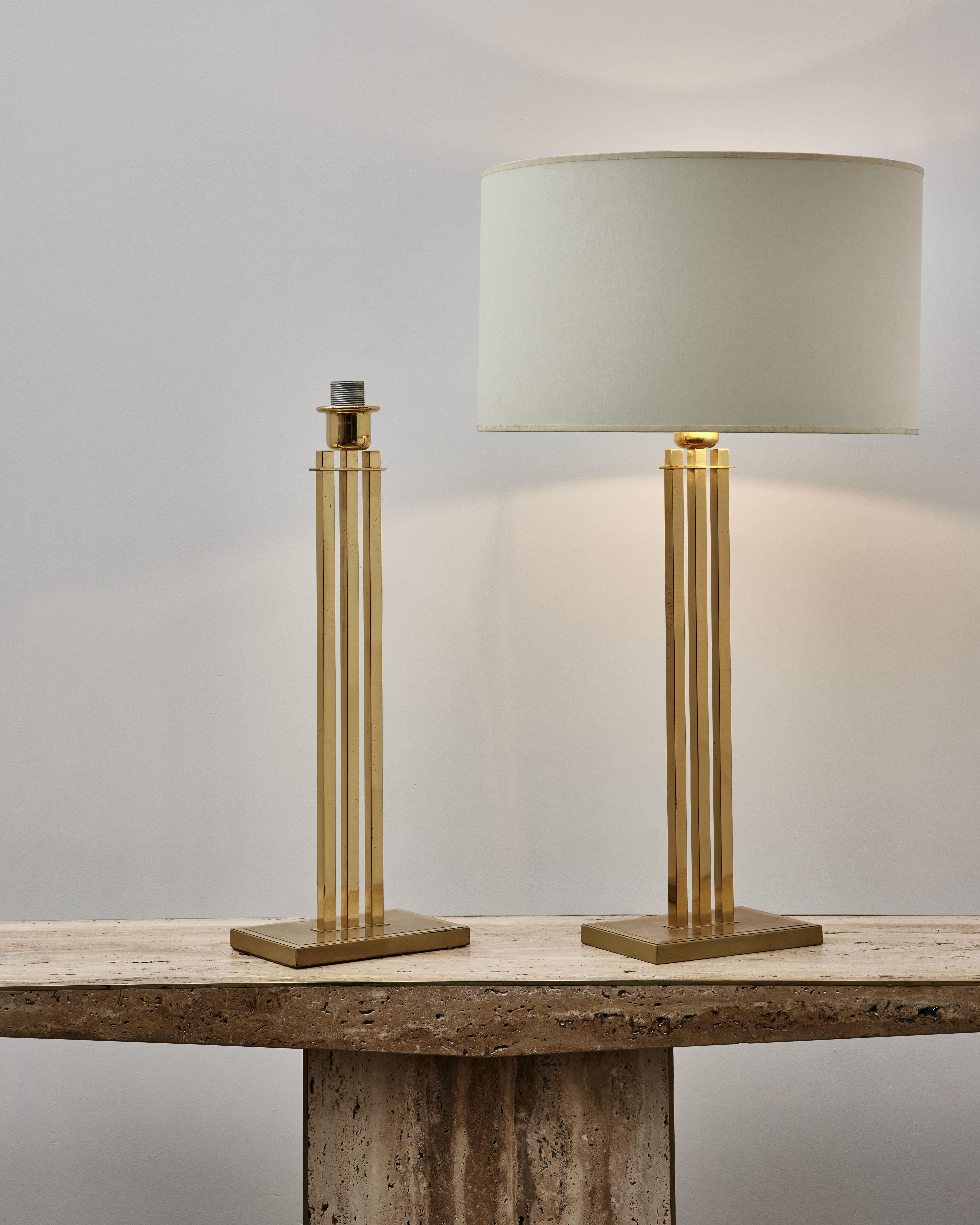 Pair of table lamps in brass.
Creation by Studio Glustin.

Dimensions: 23 x 15 x H 65 cm
(Price and dimensions without shades)