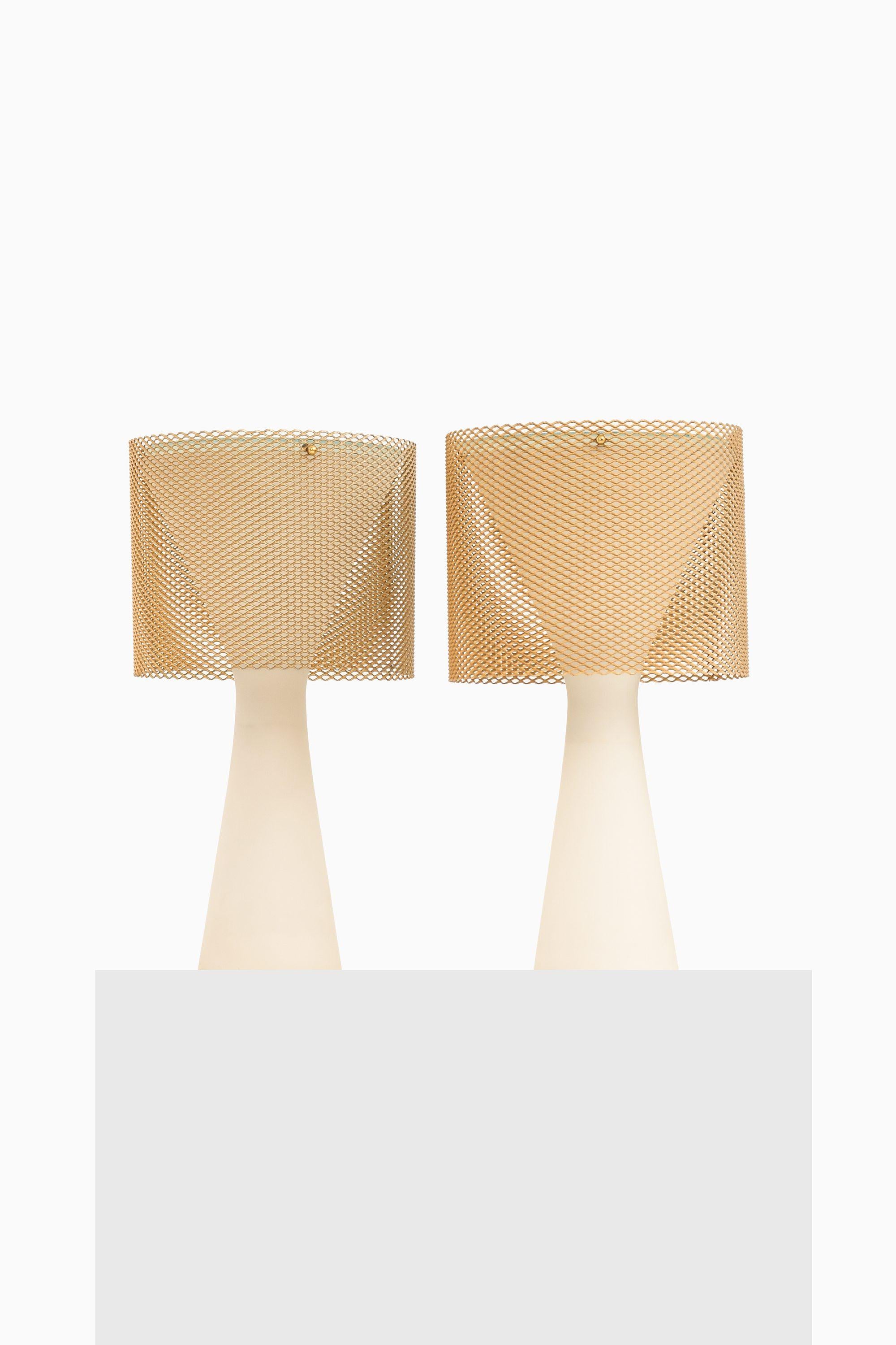 Table Lamps in Opaline Glass, Brass and Glass by Lisa Johansson-Pape, 1950's

Additional Information:
Material: Opaline glass, brass and glass
Style: Mid century, Scandinavian
Produced by Orno in Finland
Dimensions (W x D x H): 22 x 22 x 40