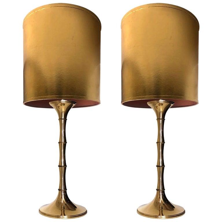 Elegant brass bamboo table lamps Model 'ML 1'. Designed by Ingo Maurer, 1968 for Design M 1968 for Design M, Munich, Germany.With new gold custom made lamp shades with Bronze inner shade. Made by Rene Houben. 
Good original vintage condition. Wear
