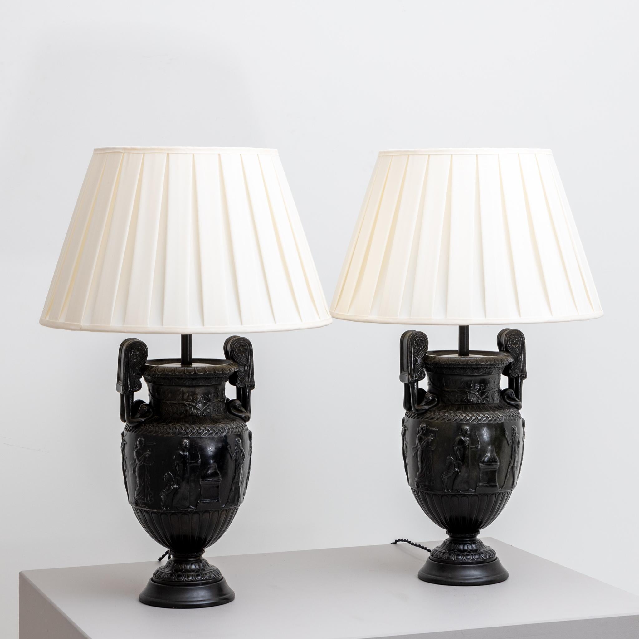 Pair of Townley spelter vases as lamp bases with white fabric lampshades.