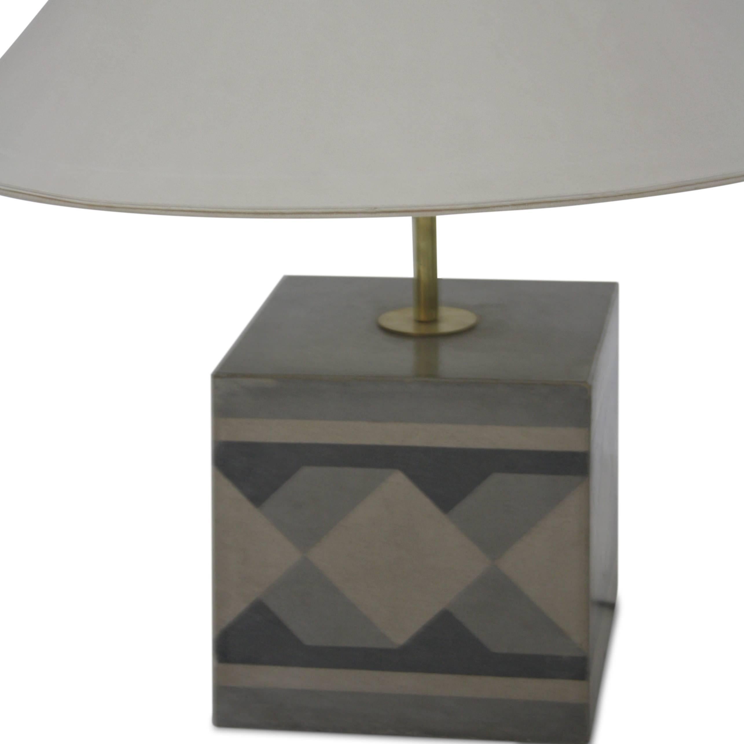 Pair of table lamps on a square ceramic base with a geometrical pattern in different shades of grey.

For the electrification we assume no liability and no warranty.